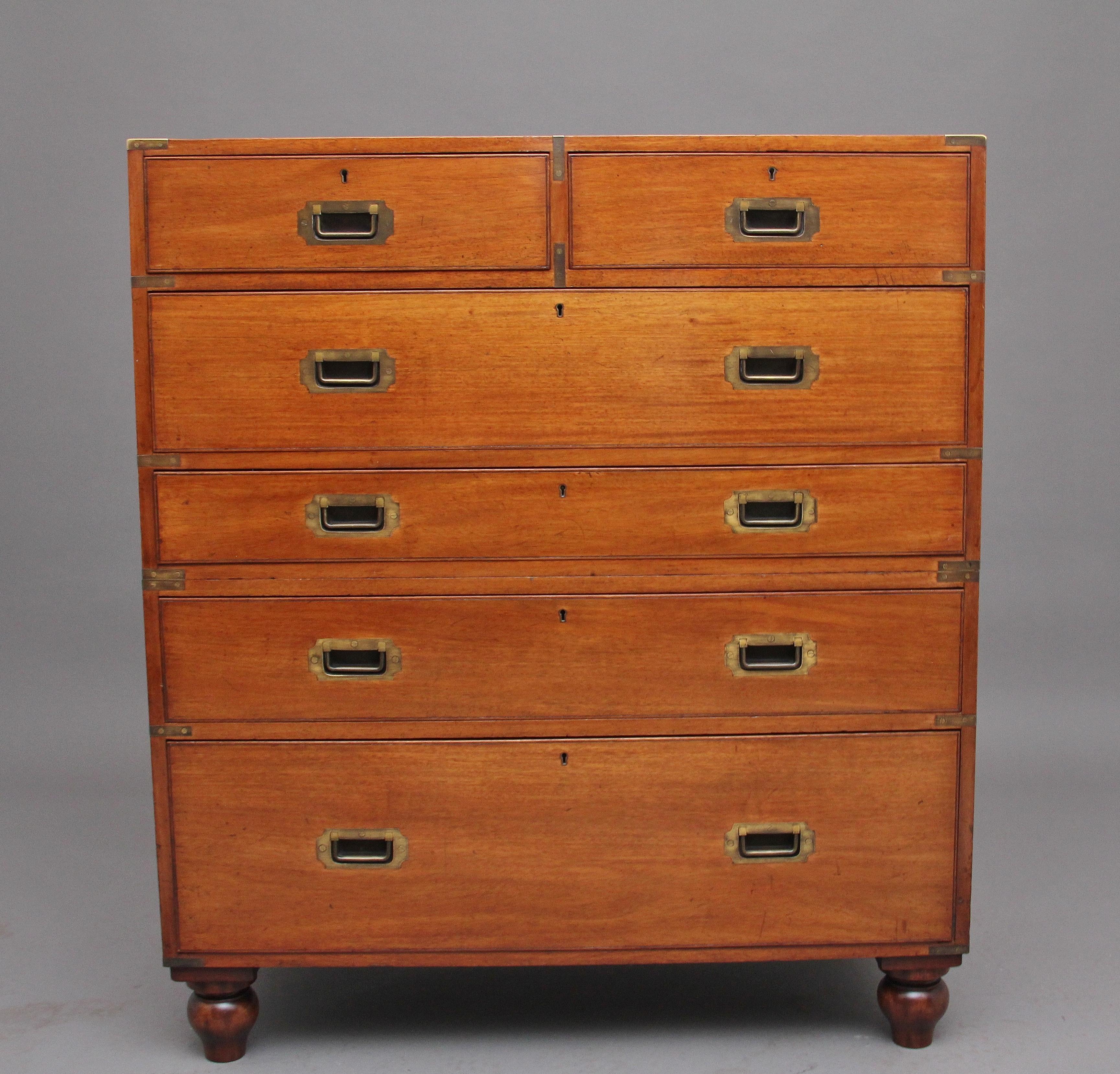 19th century mahogany military secrétaire chest, having a combination of two short over four long mahogany lined drawers with original brass recessed handles, the middle drawer pulls out to reveal a lovely quality secrétaire drawer with various