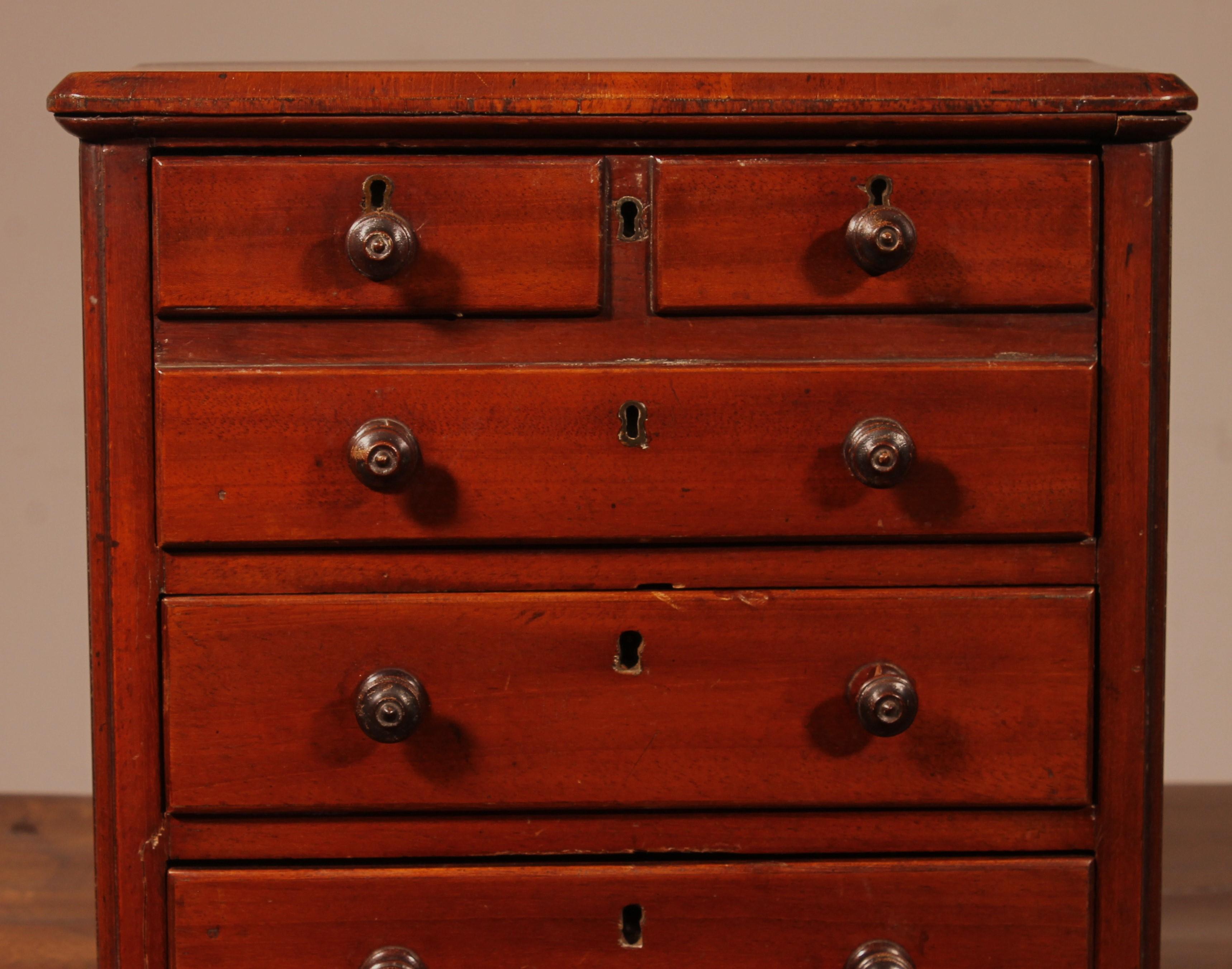 Victorian 19th Century Mahogany Miniature Chest Of Drawers For Sale