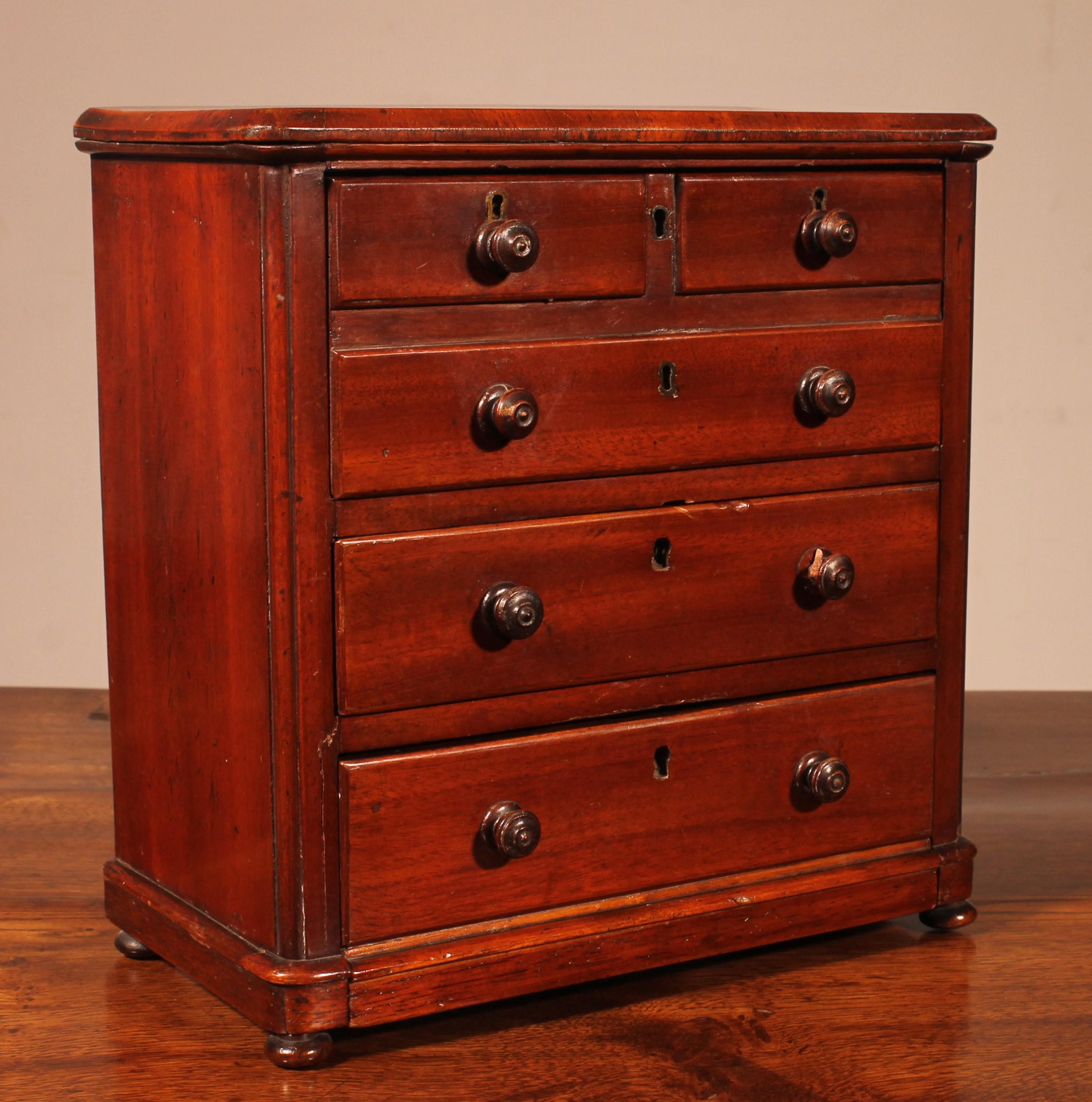 British 19th Century Mahogany Miniature Chest Of Drawers For Sale