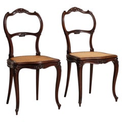 Paire de chaises Louis-Philippe en acajou du XIXe siècle, avec assises en rotin