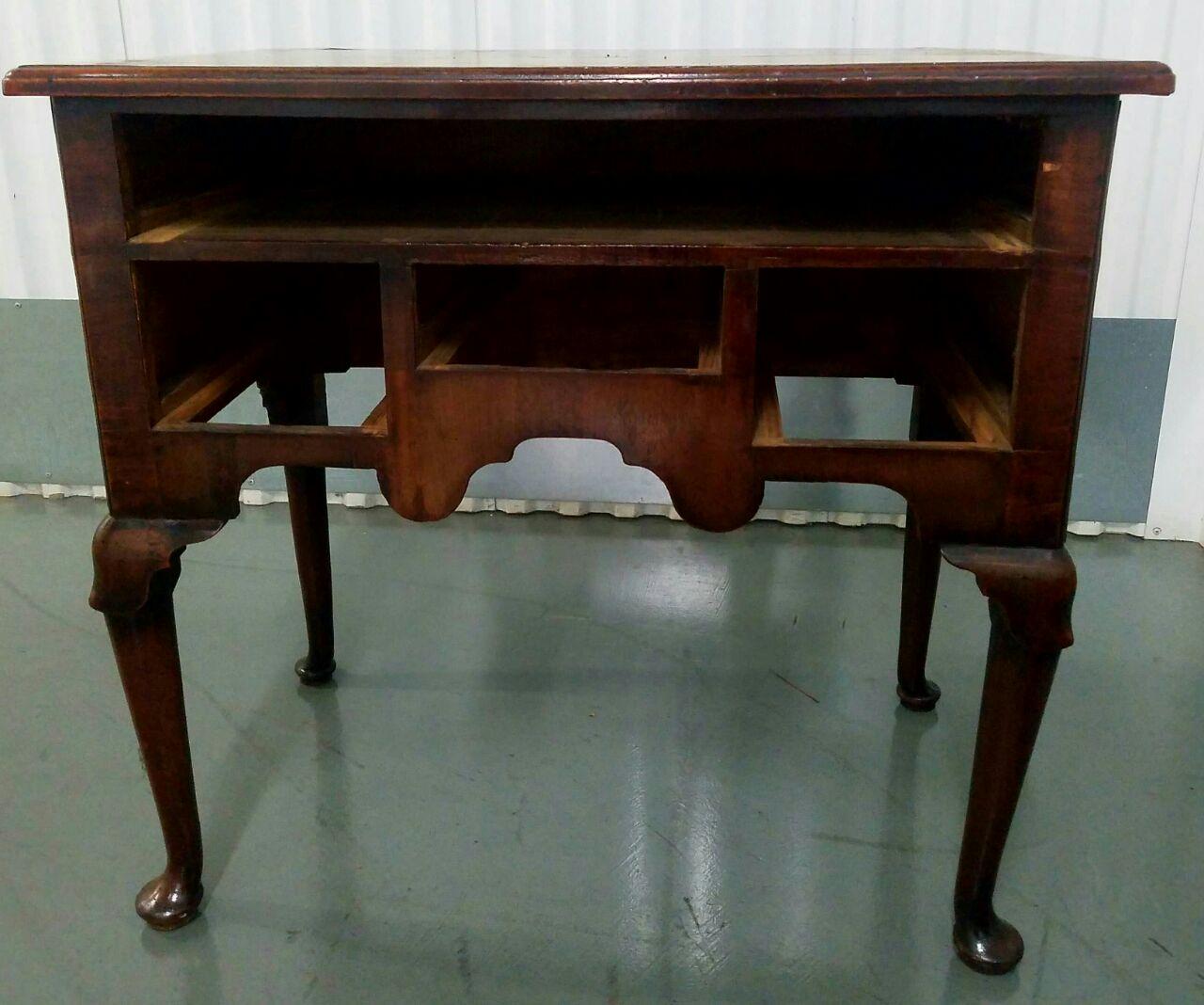 19th century mahogany Queen Anne lowboy

Beautiful antique lowboy with a rich patina. Hand carved and custom made.

This lowboy has a small footprint and will fit into most spaces. This would be a great laptop desk, console table, or vanity