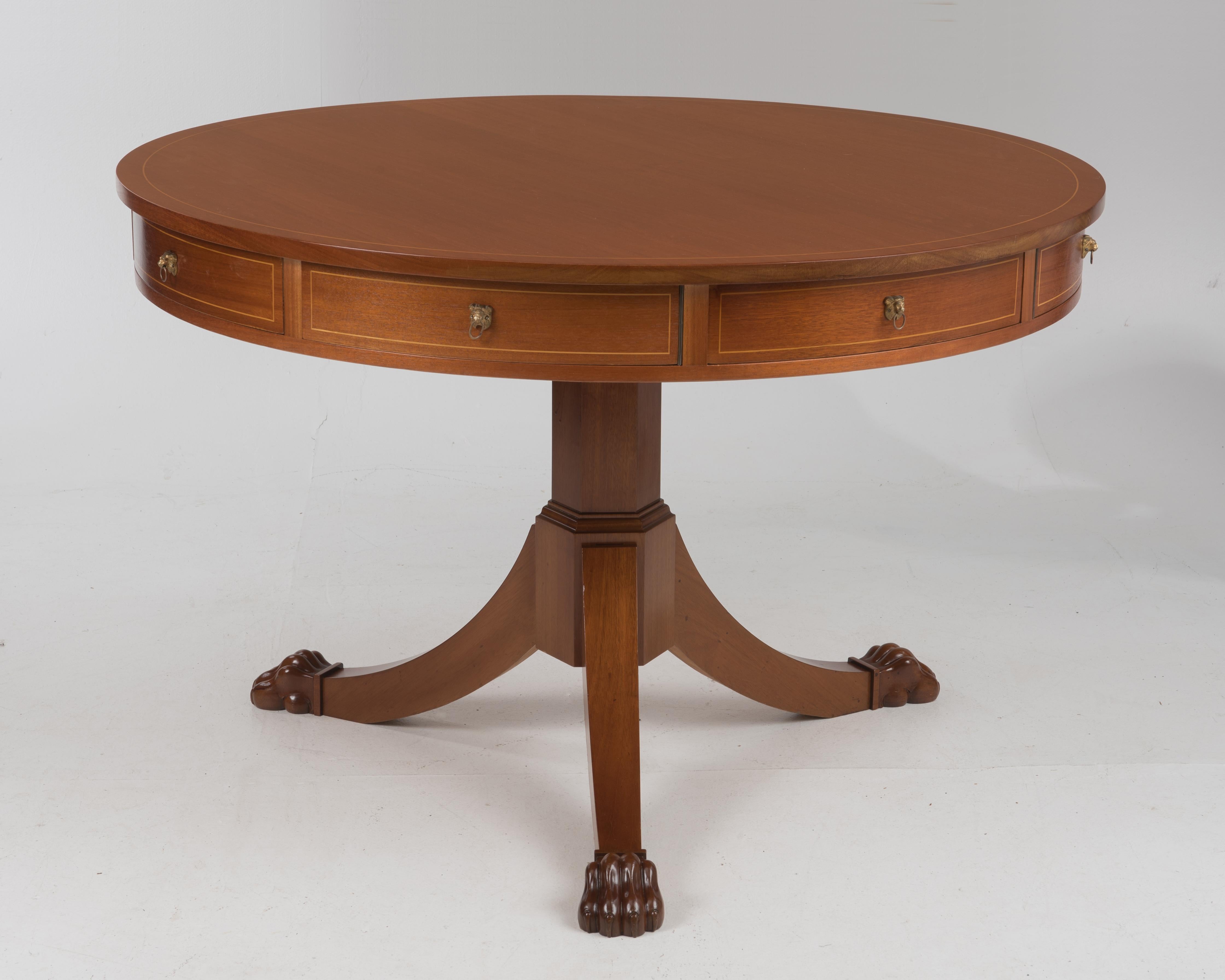 A well made 19th century rent table. Mahogany with paw feet. Purchased direct from an estate and we were told the table was purchased by a family member in Geneva 35 years ago. Leg clearance is 24