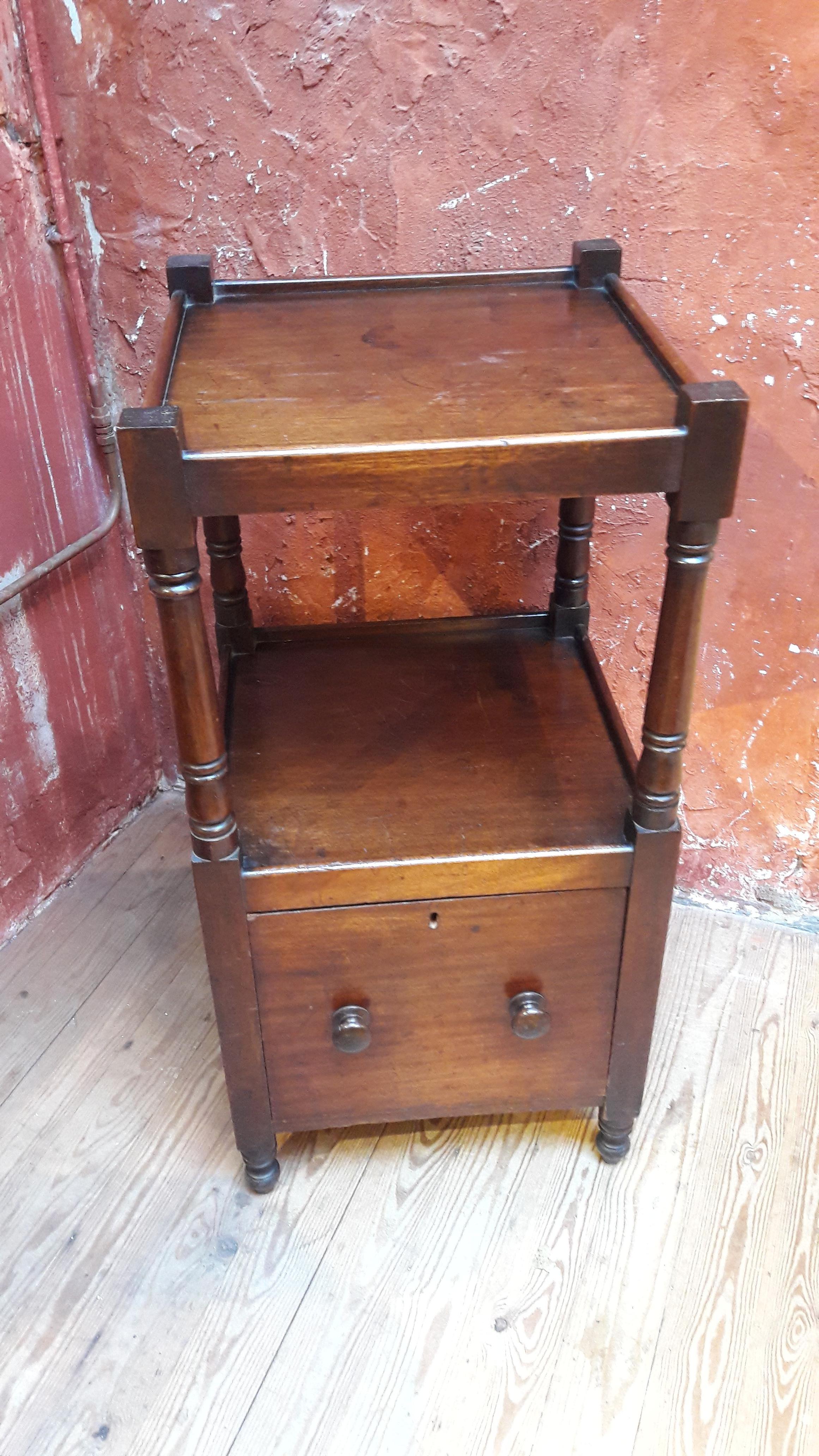 Useful mahogany table with one large drawer. Can be used as a bedside table.