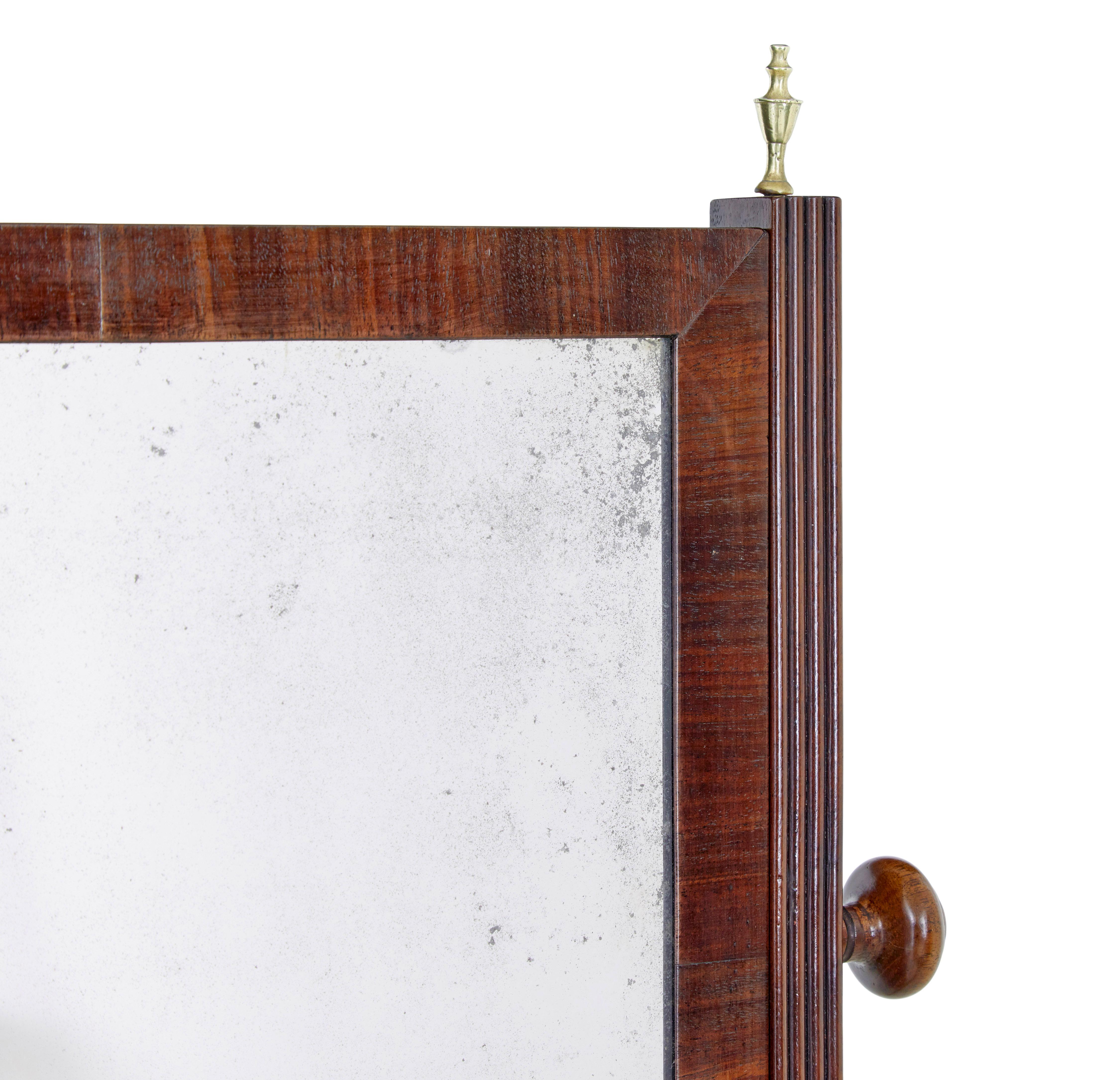 19th century mahogany toilet mirror circa 1870.

Good quality mirror, which could be used around the home in the bathroom, bedroom or hallway.

Rectangular mirror encased in a mahogany frame, suspended by reeded supports and stretcher, standing on a