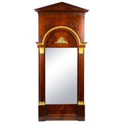 Specchio da molo con cornice in bronzo in legno di mogano del XIX secolo