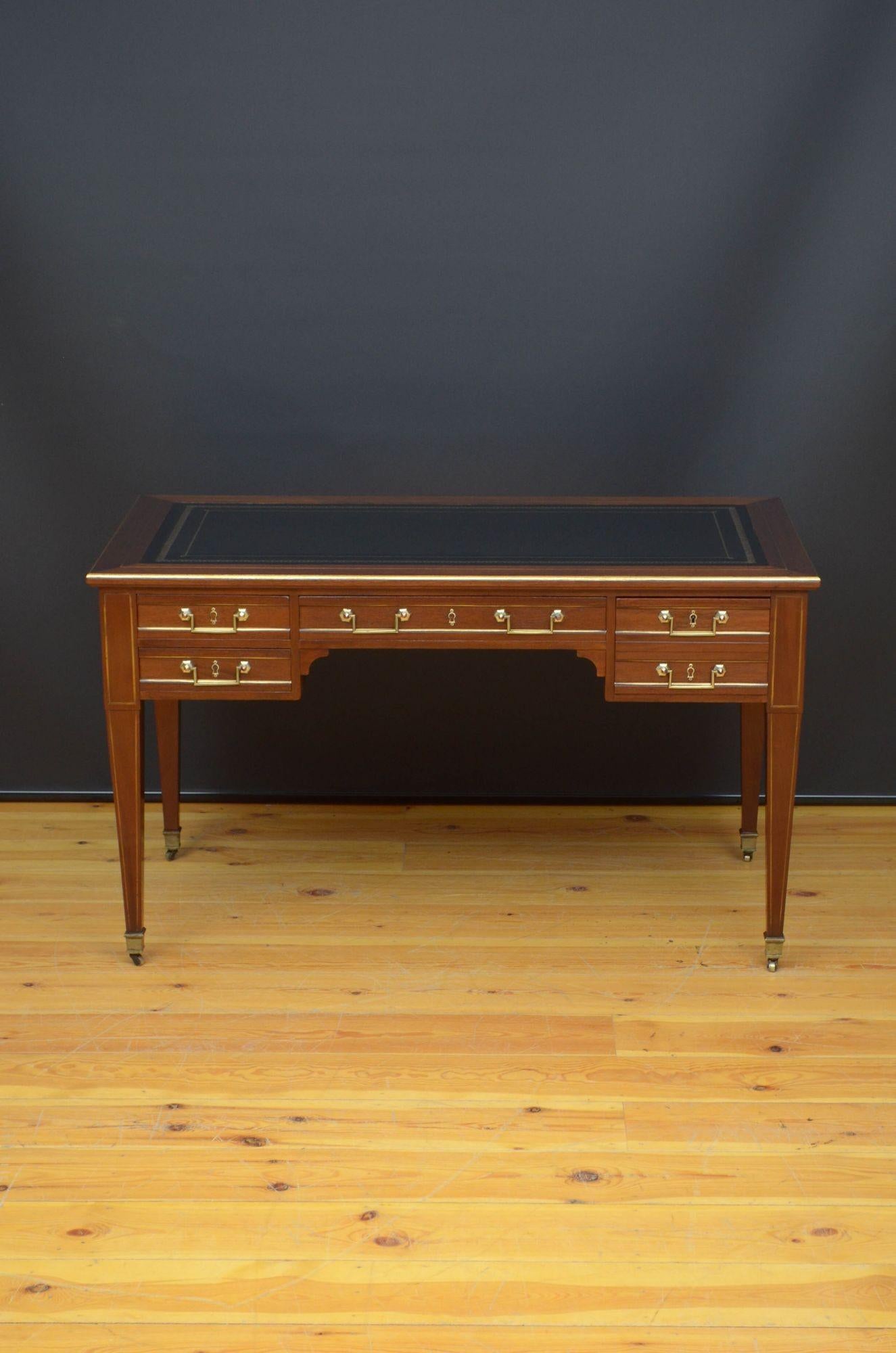 Sn5272  Fine quality 19th century mahogany writing desk of goods proportions, having new tooled black leather to the top flanked by two sliders above long centre drawer flanked by two drawers to the left and one deep drawer to the right, all fitted