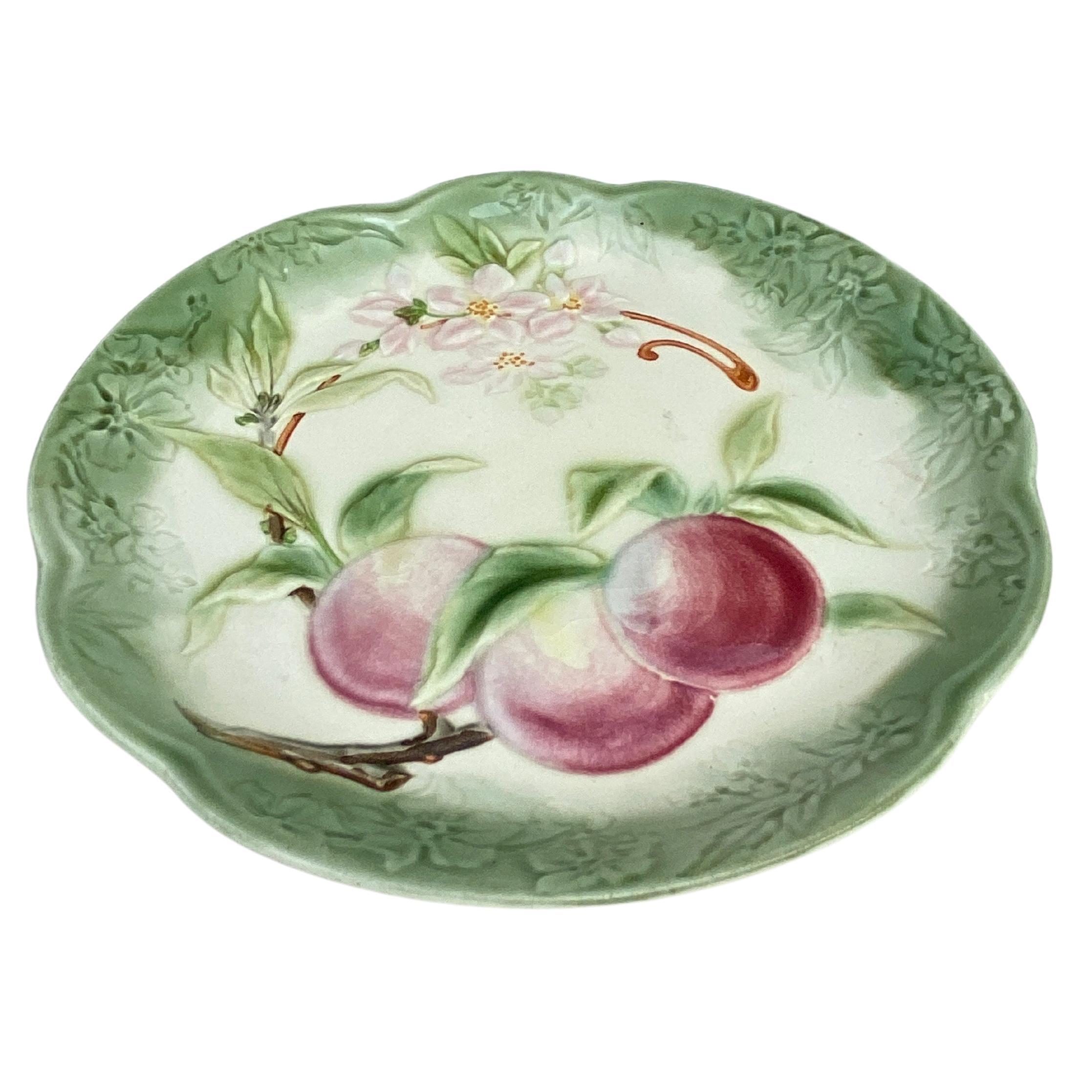 19th century Majolica Apples plate signed Choisy Le Roi.
Made for Higgins & Seiter New York.
The Higgins & Seiter Company of New York City began selling decorations for the table, including rich-cut glass in 1887. By 1891 the firm was