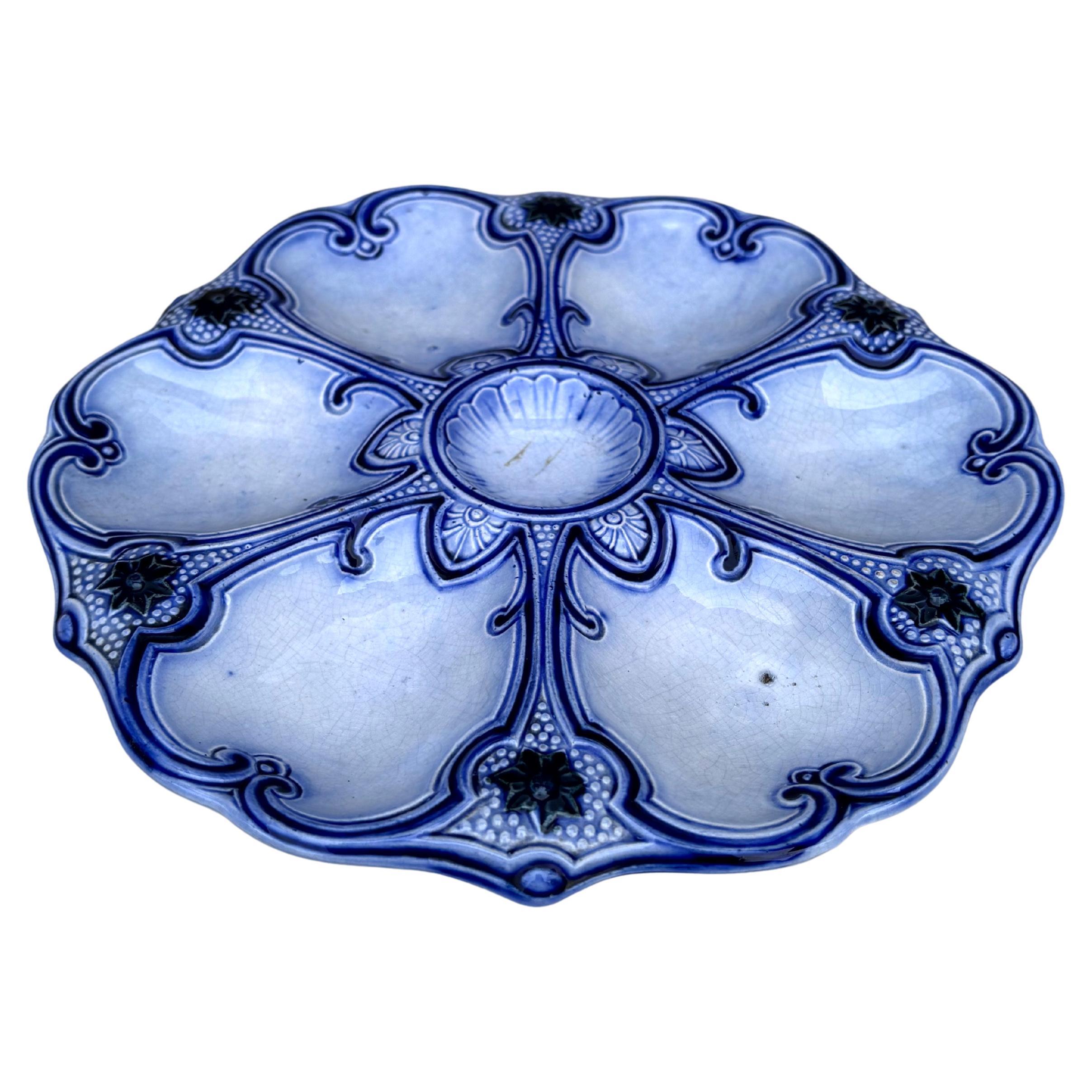 Plato de ostra azul y blanco Wasmuel Majolica del siglo XIX.
Referencia / Página 48 