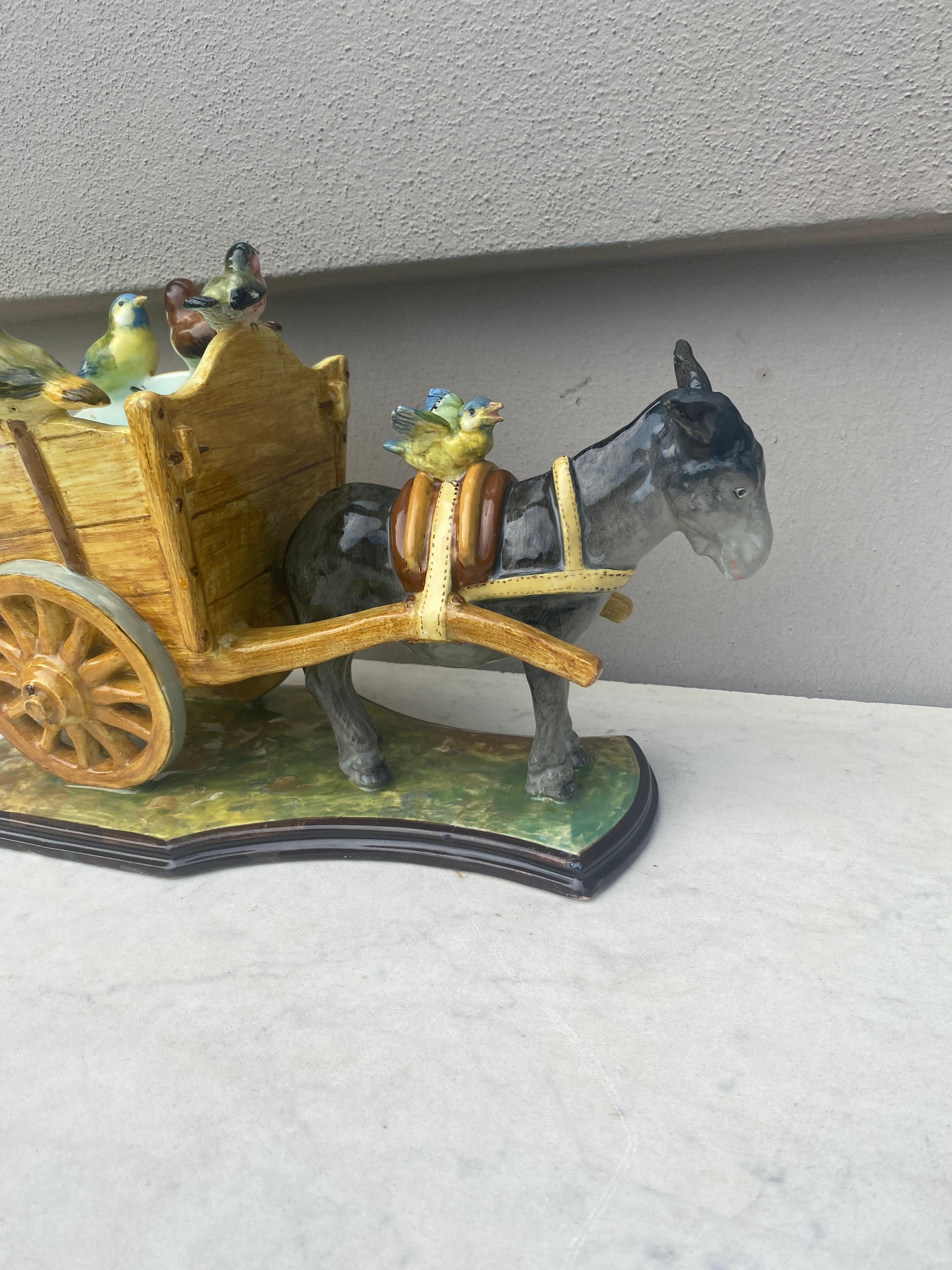 Large French Majolica cart with donkey & birds signed Delphin Massier.
The Massier are known for the quality of their unique enamels and paintings.
The Massier family produced different pieces with birds in a very creative style in Vallauris on