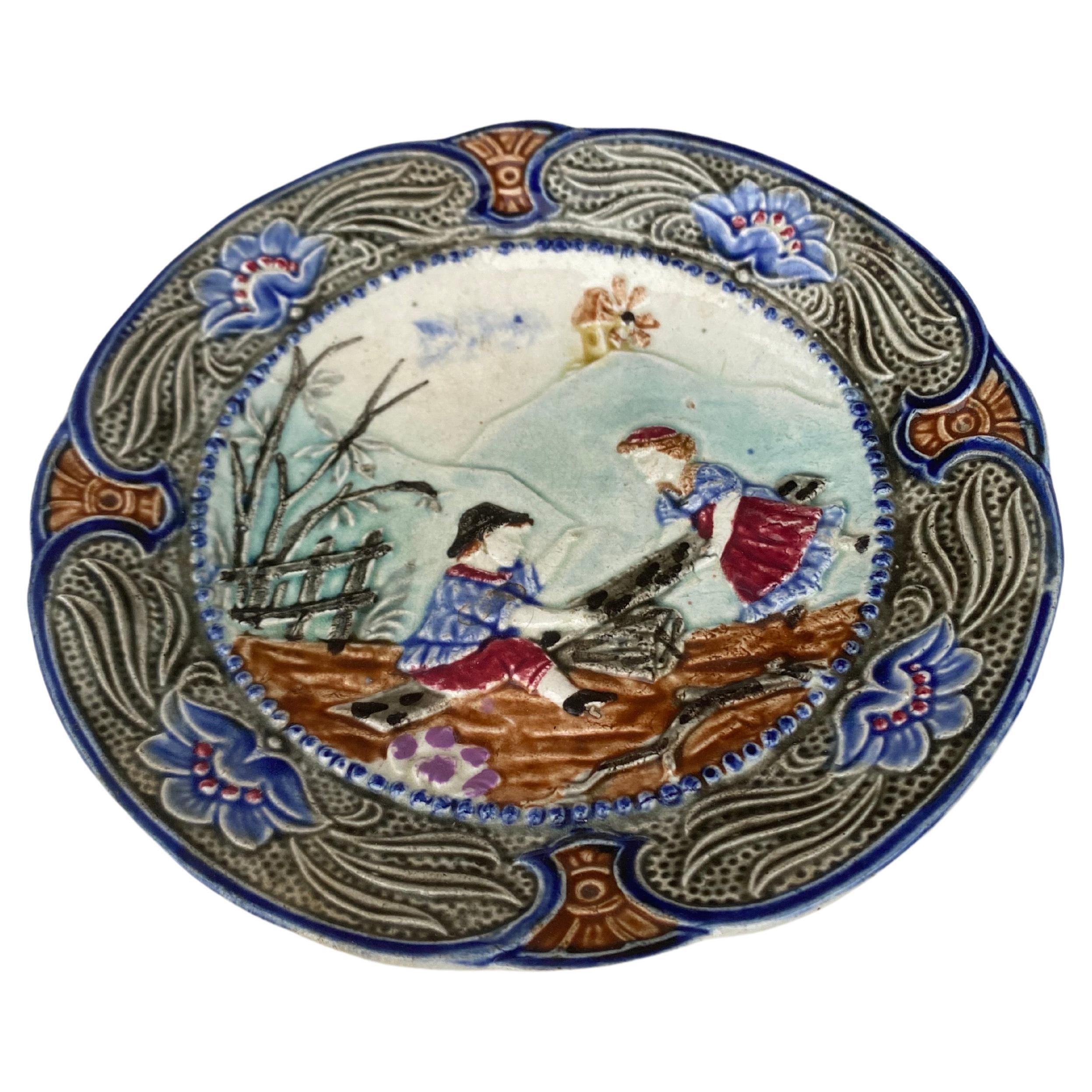 19th Century Majolica plate Wasmuel.
Childrens playing.