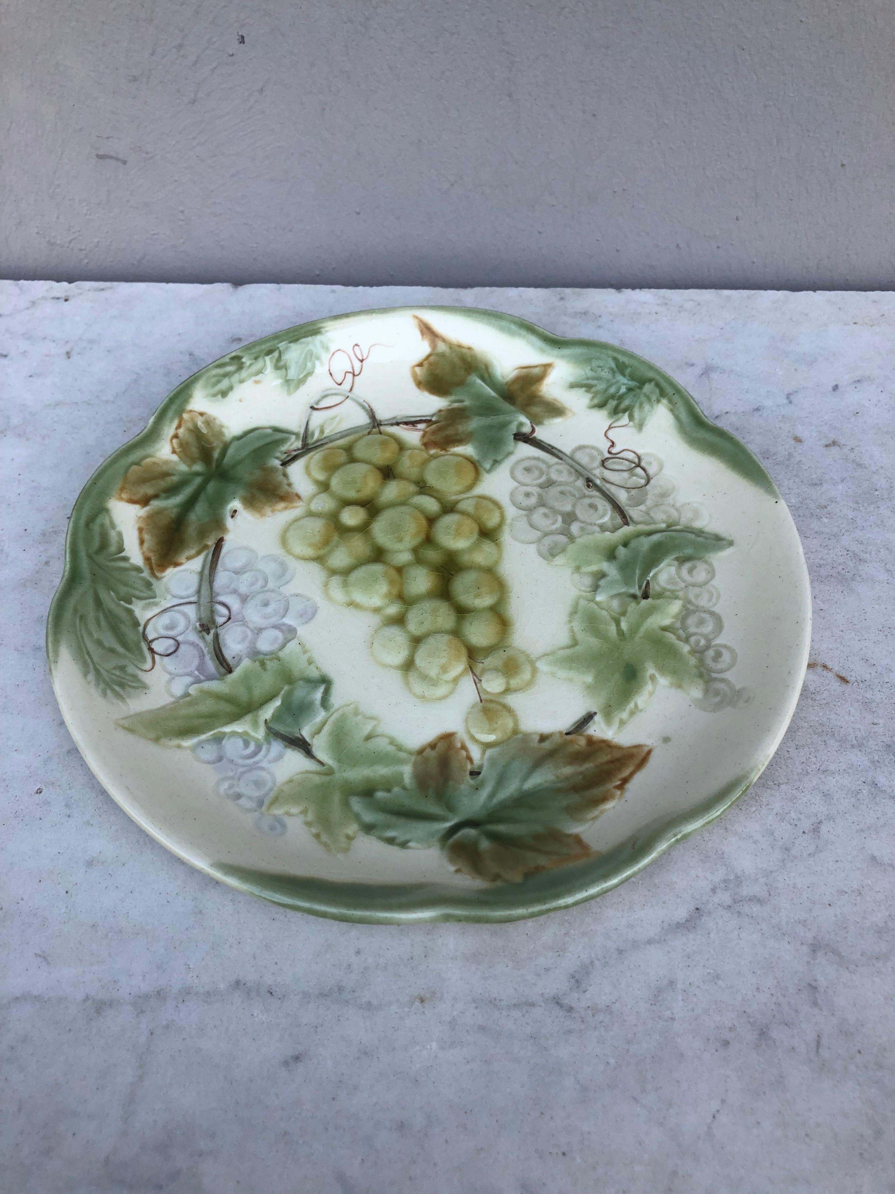 19th century Majolica Grapes plate signed Choisy Le Roi.
Made for Higgins & Setter New York.
The Higgins & Seiter Company of New York City began selling decorations for the table, including rich-cut glass in 1887. By 1891 the firm was