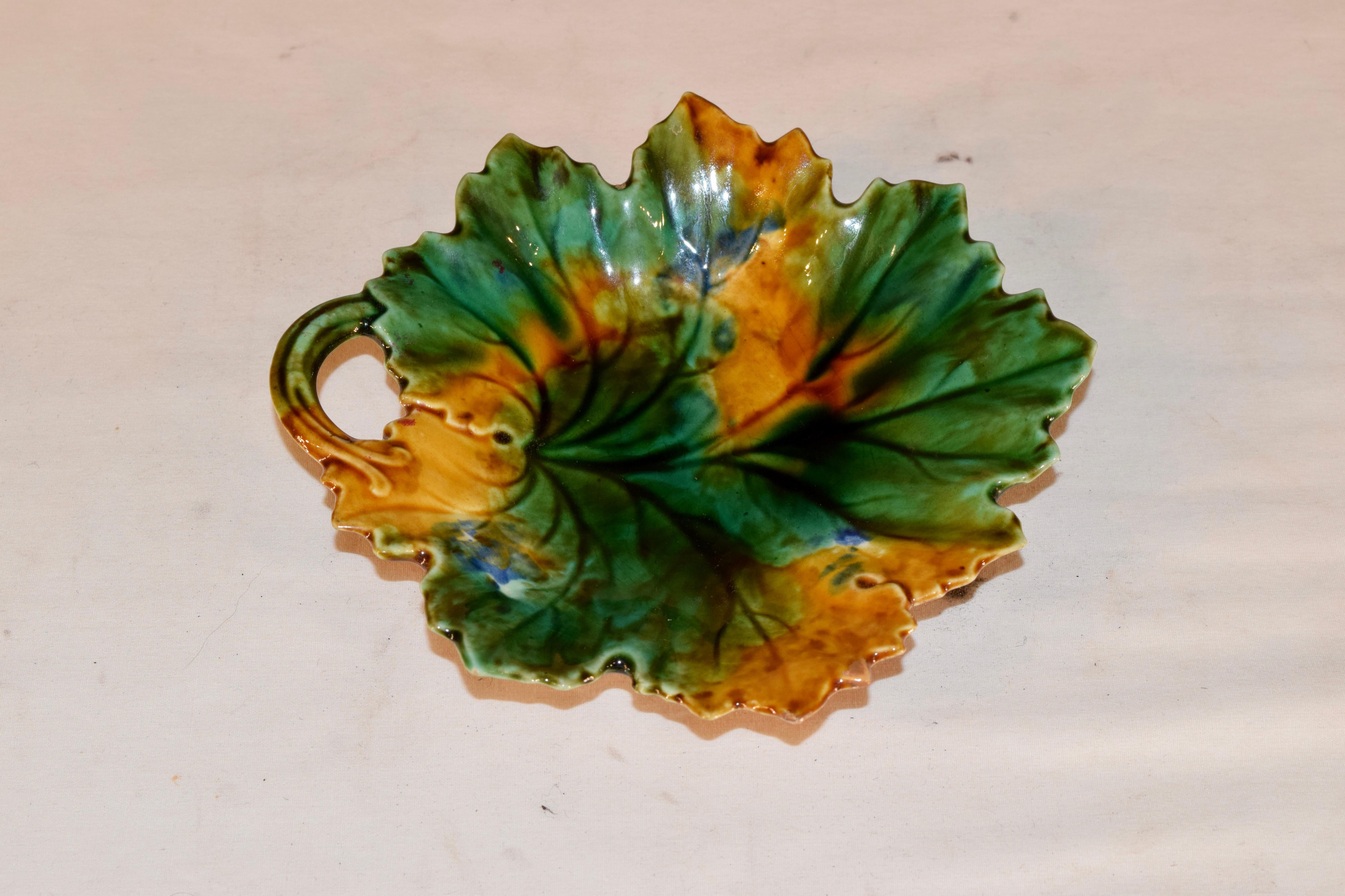 Late 19th century majolica leaf dish with lovely mottled coloring and a wonderful shape. Marked CH A Luxembourg on bottom.