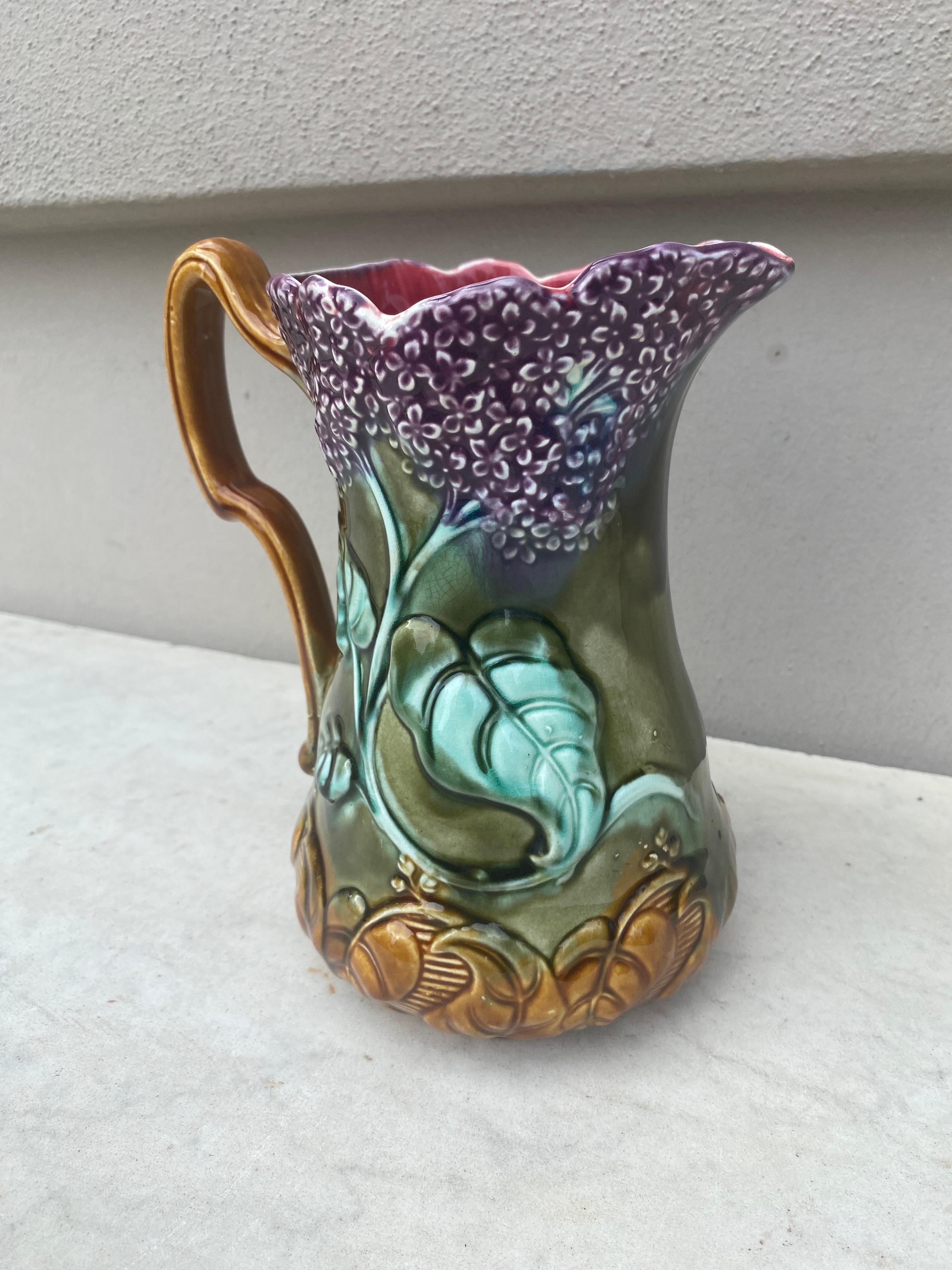 19th century Majolica lilac pitcher signed Onnaing.