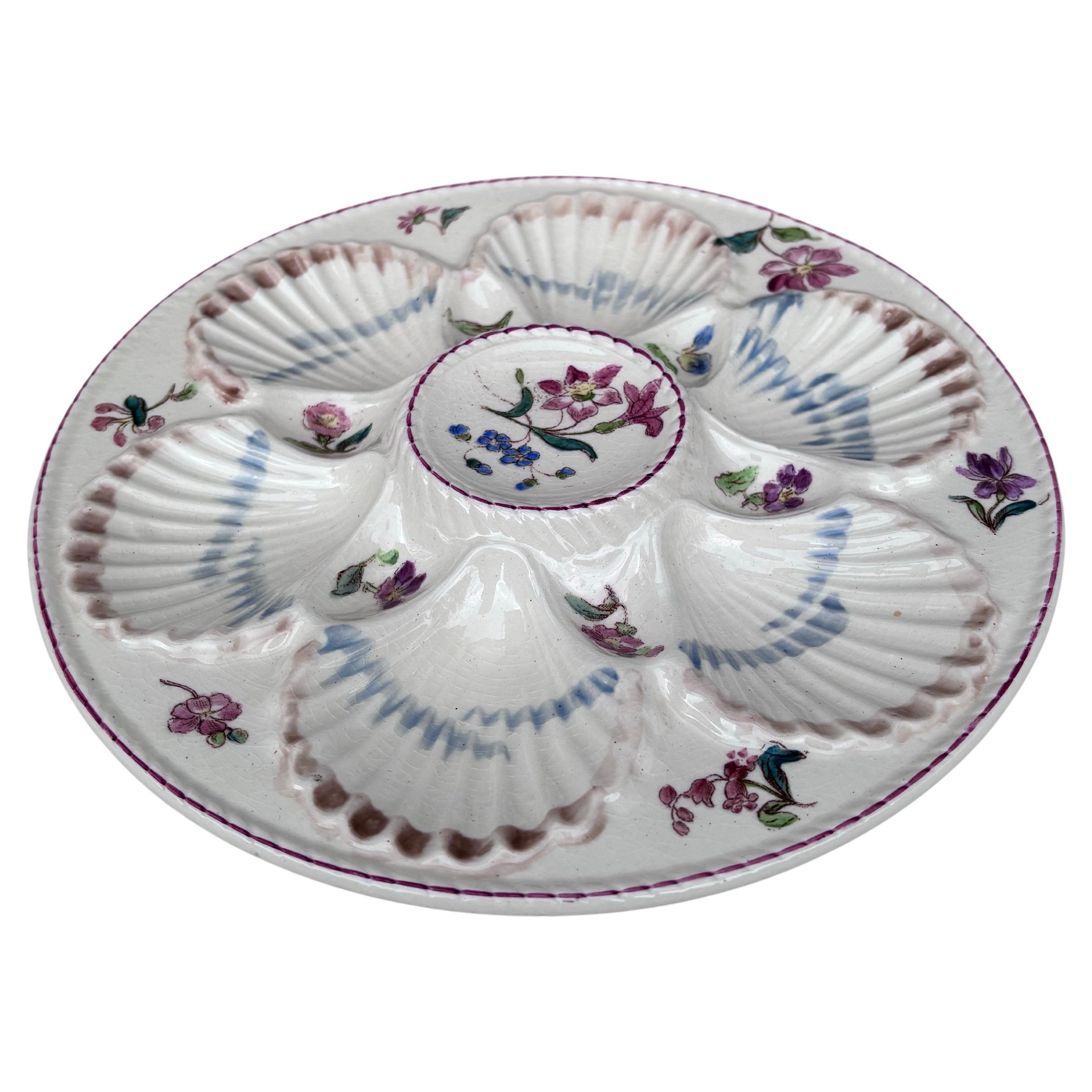 French Majolica oyster plate with flowers circa 1890 signed Longchamp.