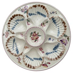 Piatto in maiolica del XIX secolo con fiori di ostrica Longchamps