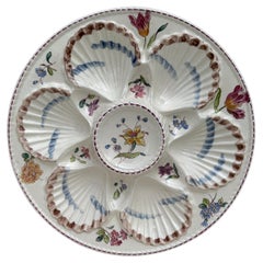 Plato de flores de ostra Longchamp de mayólica del siglo XIX