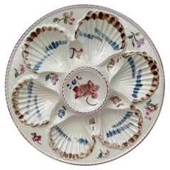 Piatto in maiolica del XIX secolo con fiori di ostrica Longchamps