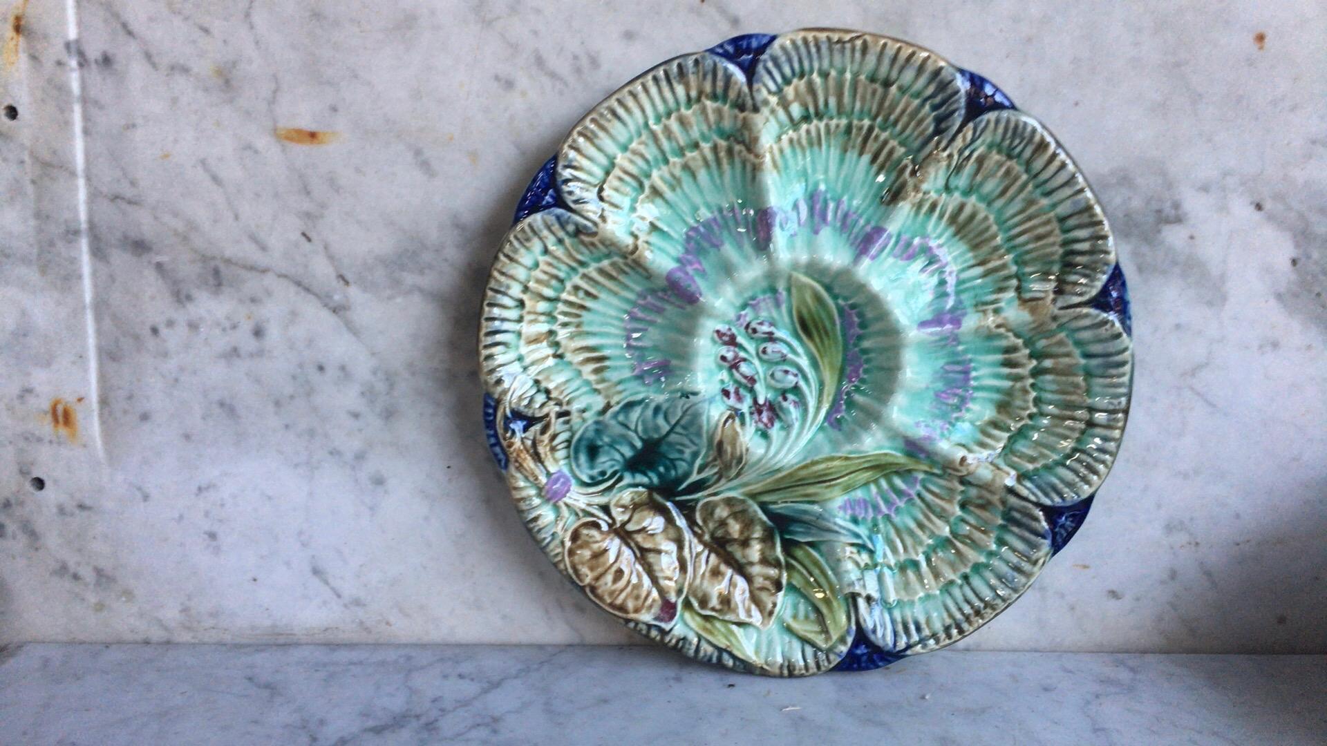 Rare 19th century Majolica blue oyster plate Wasmuel (Belgium) decorated with flowers.