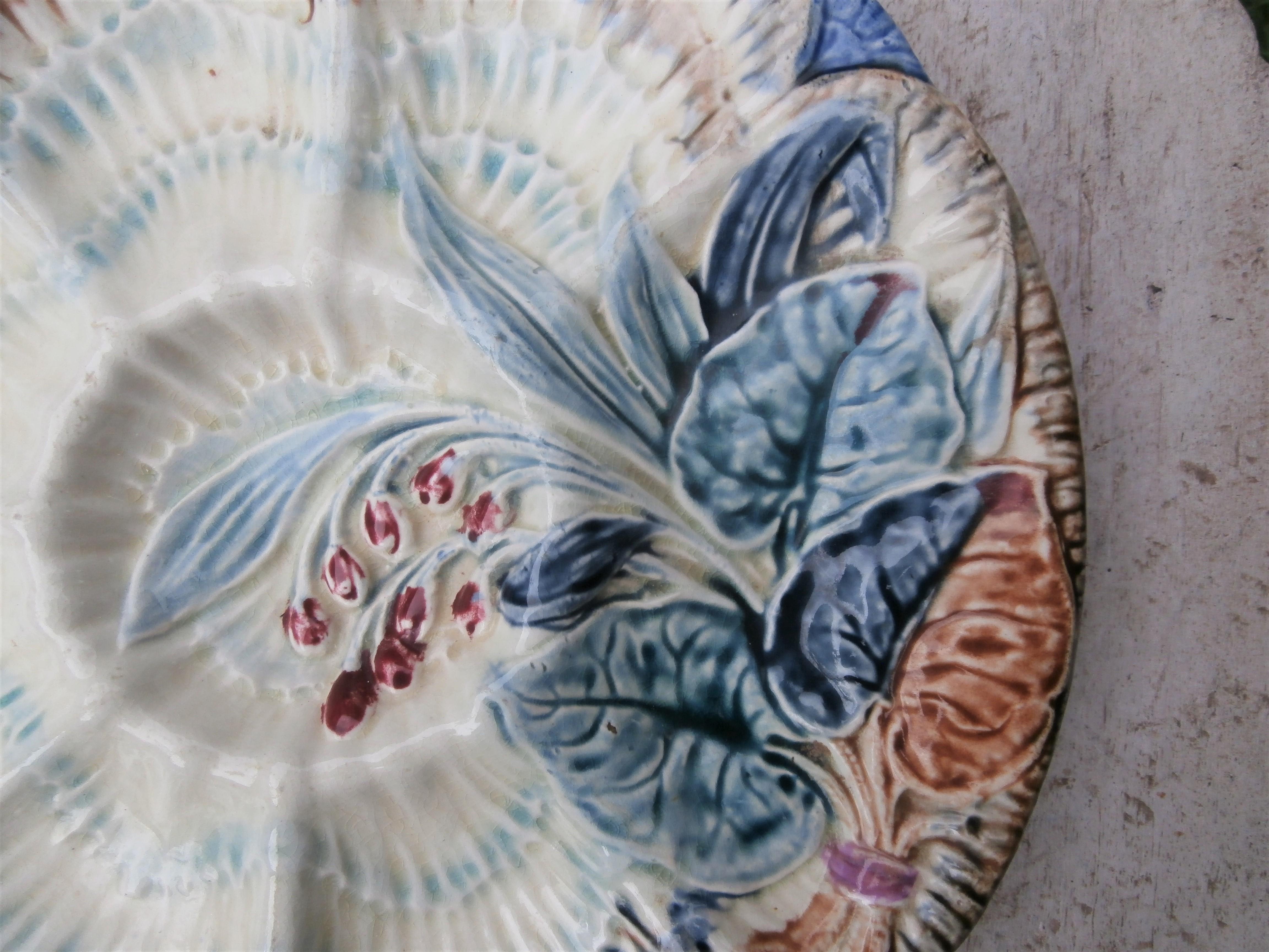 19th century Majolica oyster plate Wasmuel ( Belgium ) decorated with flowers.