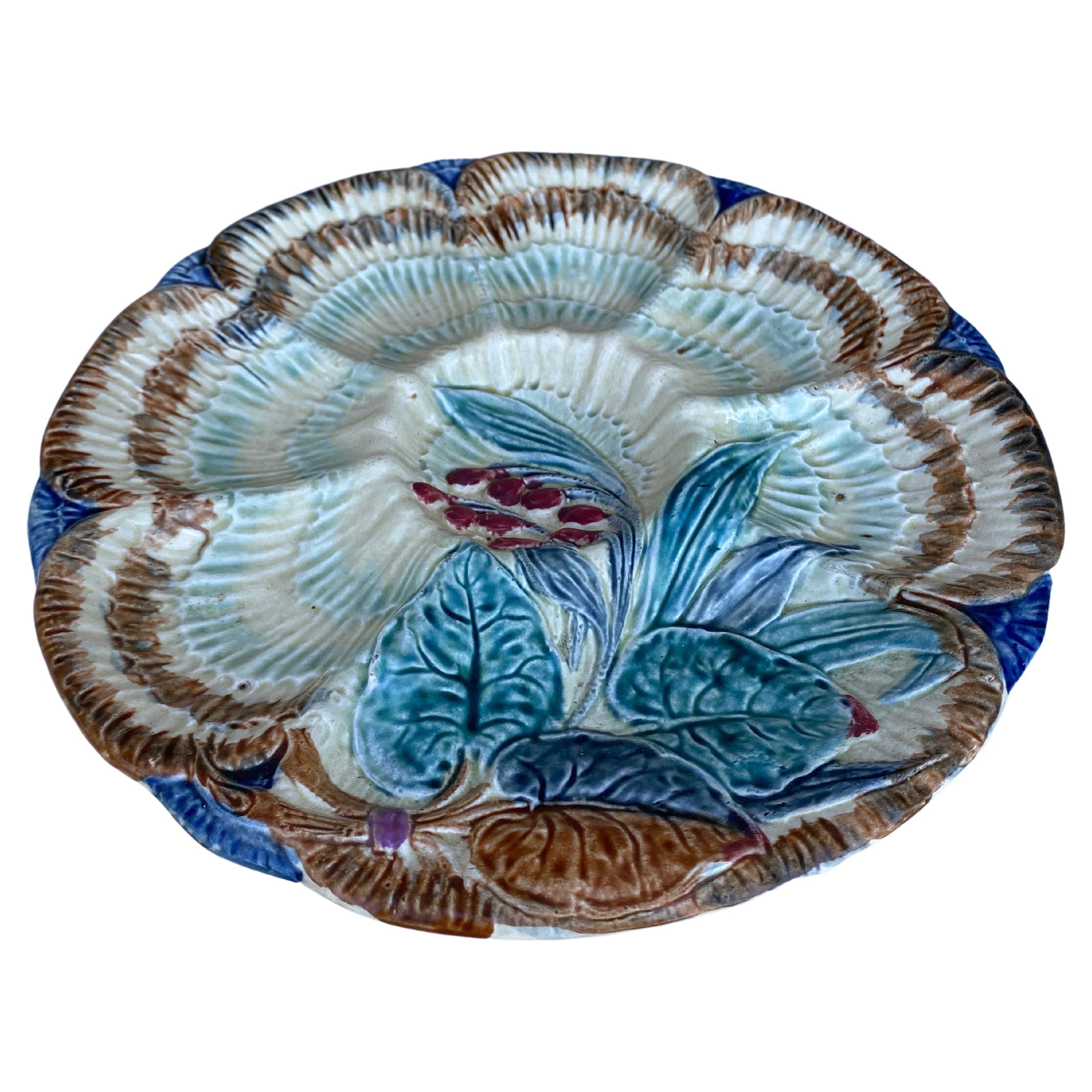 19th-Century Majolica oyster plate Wasmuel (Belgium) decorated with flowers.