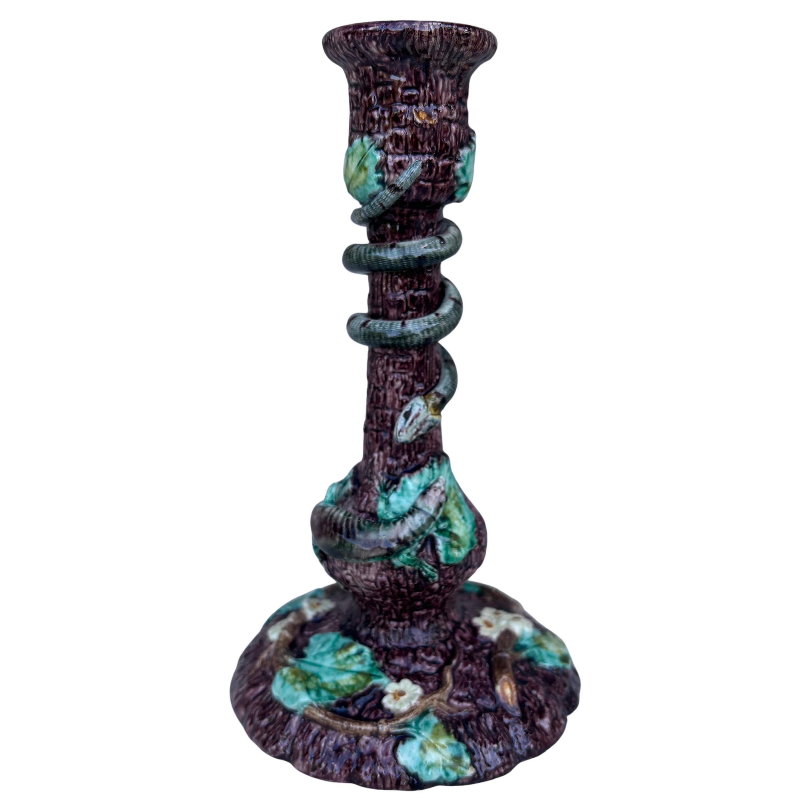 French Palissy candlestick signed Thomas Sergent, circa 1880.
Trompe l'oeil wood with leaves decorated with snake and lizard.
Thomas Victor Sergent was an active member of the School of Paris with others ceramists he made platters and other several