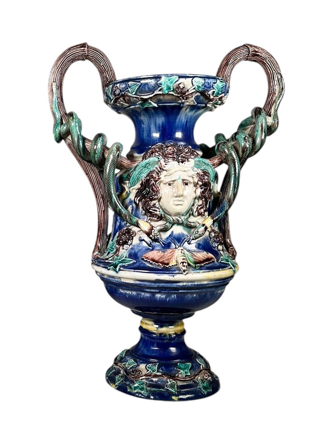Beautiful pair of Majolica Palissy vases, richly glazed and finely detailed in the naturalistic style characteristic of the period. Each vase displays vibrant color and texture, showcasing the exceptional craftsmanship of late 19th century majolica