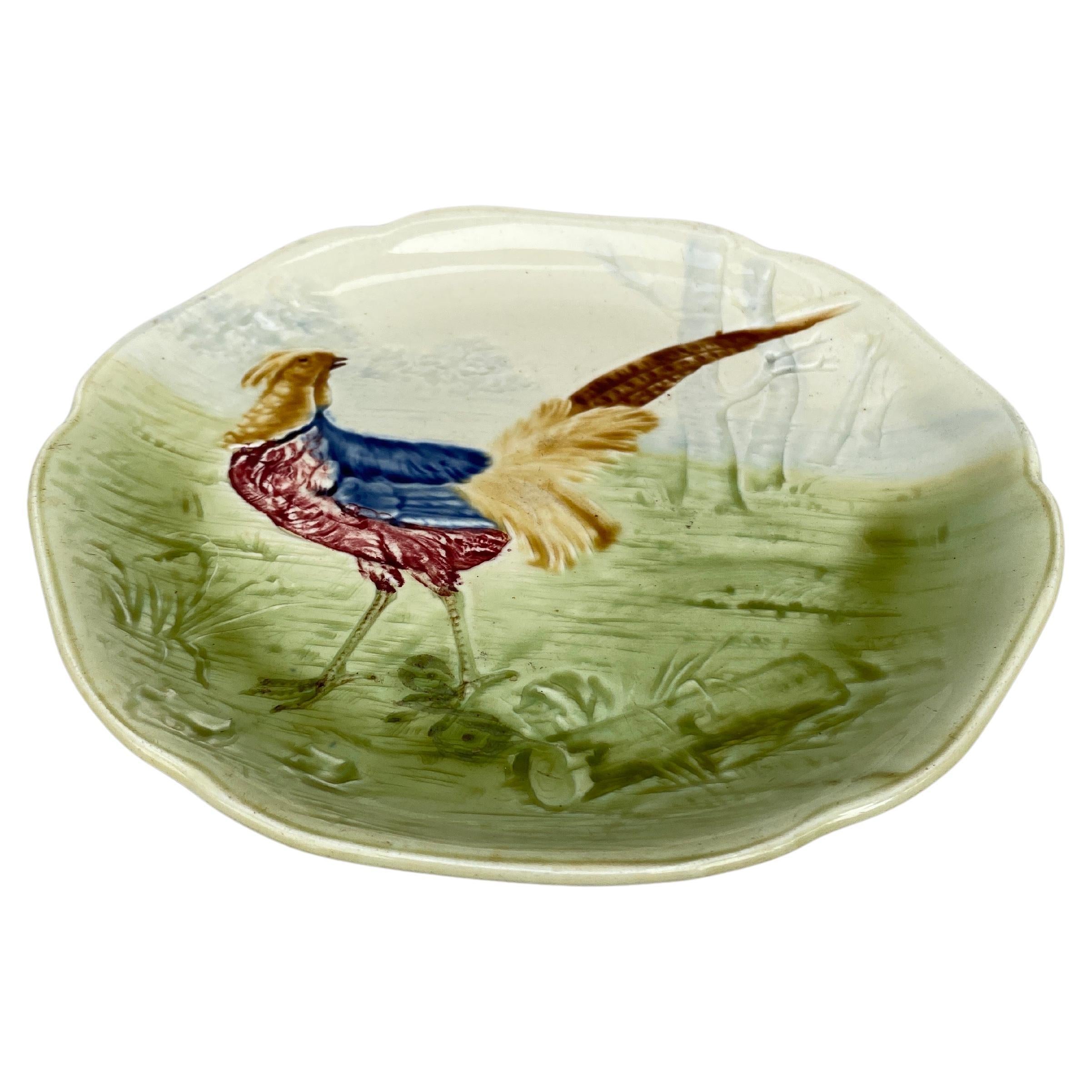 Majolica plate with a pheasant in the woods signed Hippolyte Boulenger Choisy le Roi, circa 1890.
The manufacture of Choisy le Roi was one of the most important manufacture at the end of 19th century, they produced very high quality ceramics of all