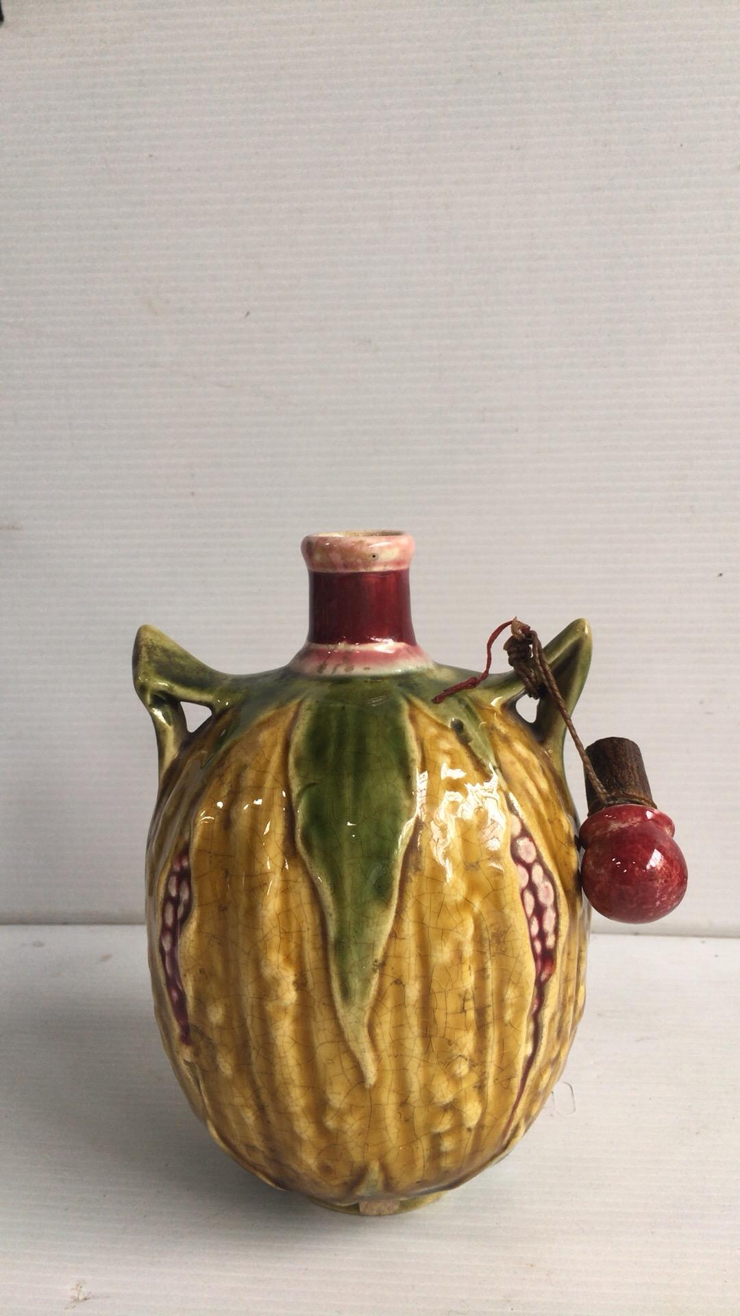 Unusual 19th century Majolica pomegranate liquor pitcher.