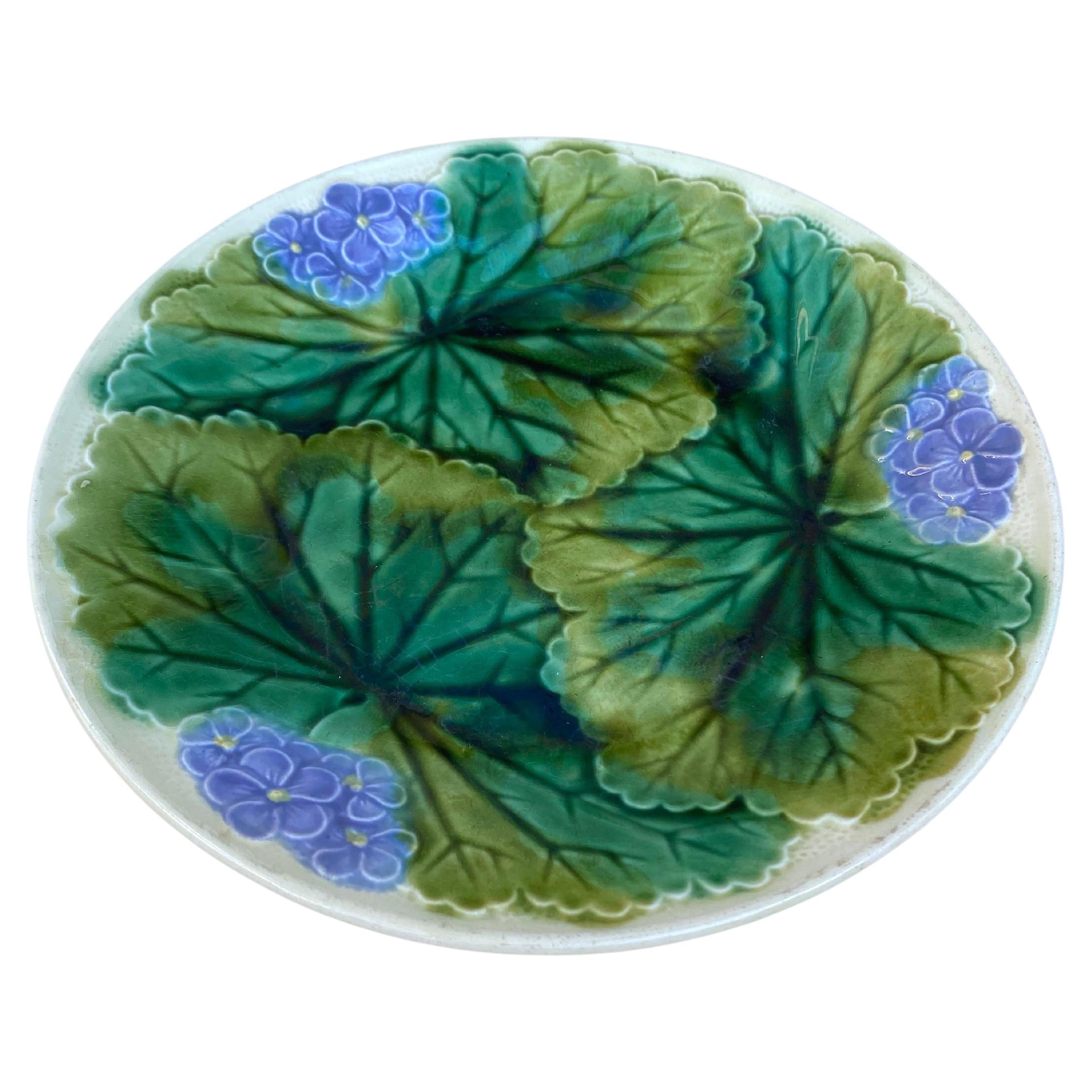 19th Century Majolica purple flowers plate signed Clairefontaine.