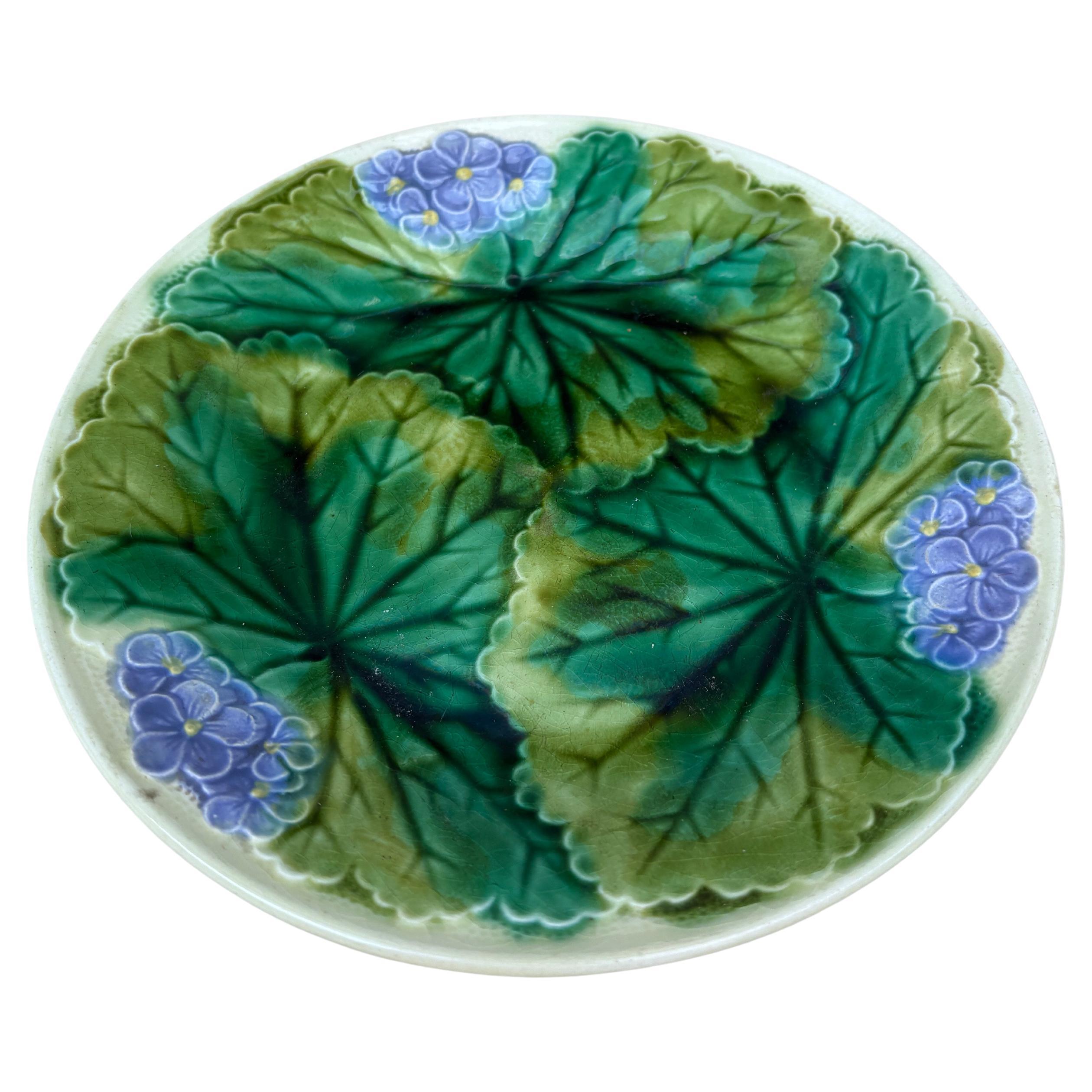 19th Century Majolica purple flowers plate signed Clairefontaine.