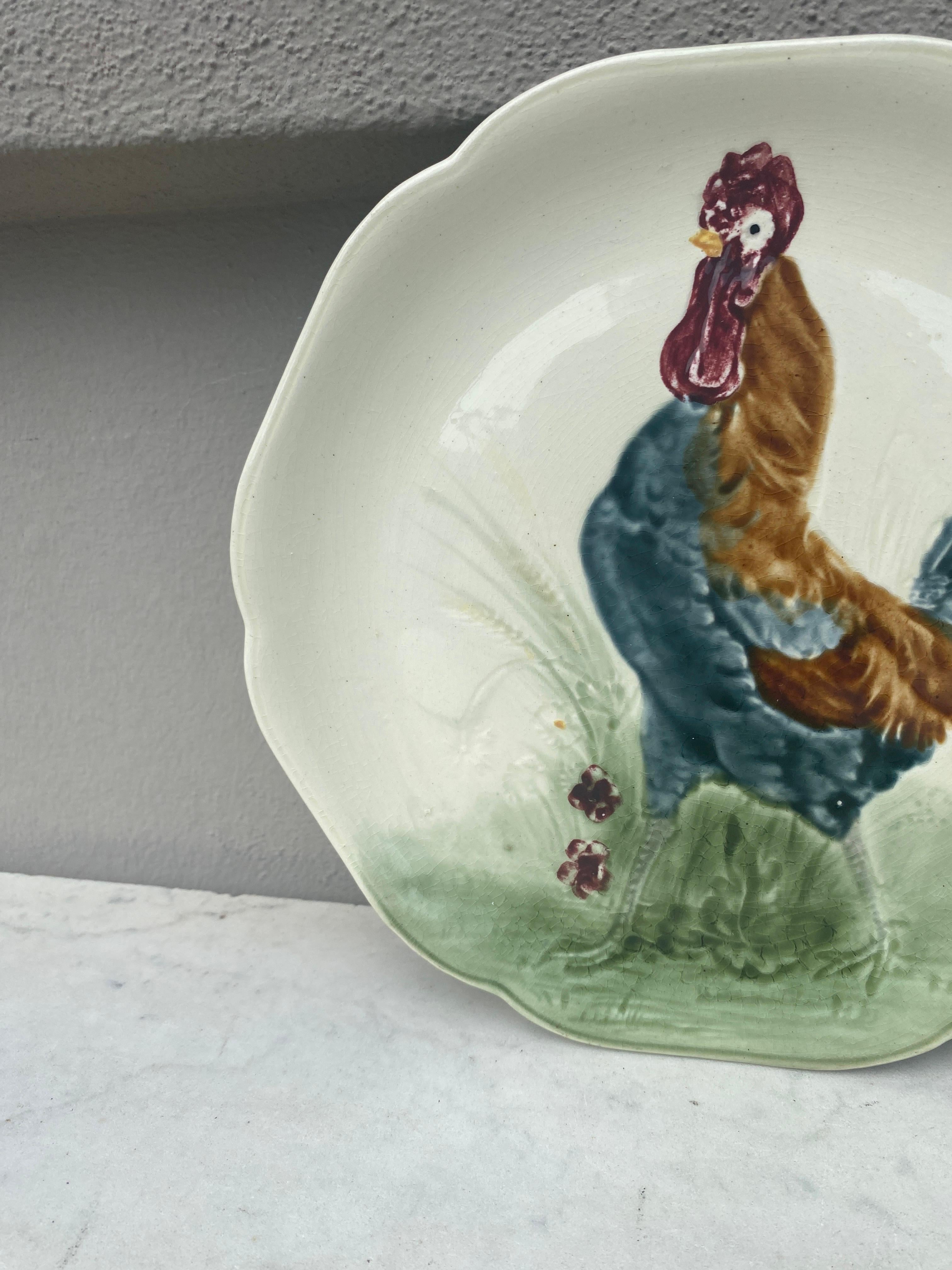 Majolica plate with rooster signed Hippolyte Boulenger Choisy le Roi, circa 1890.
The manufacture of Choisy le Roi was one of the most important manufacture at the end of 19th century, they produced very high quality ceramics of all kinds as