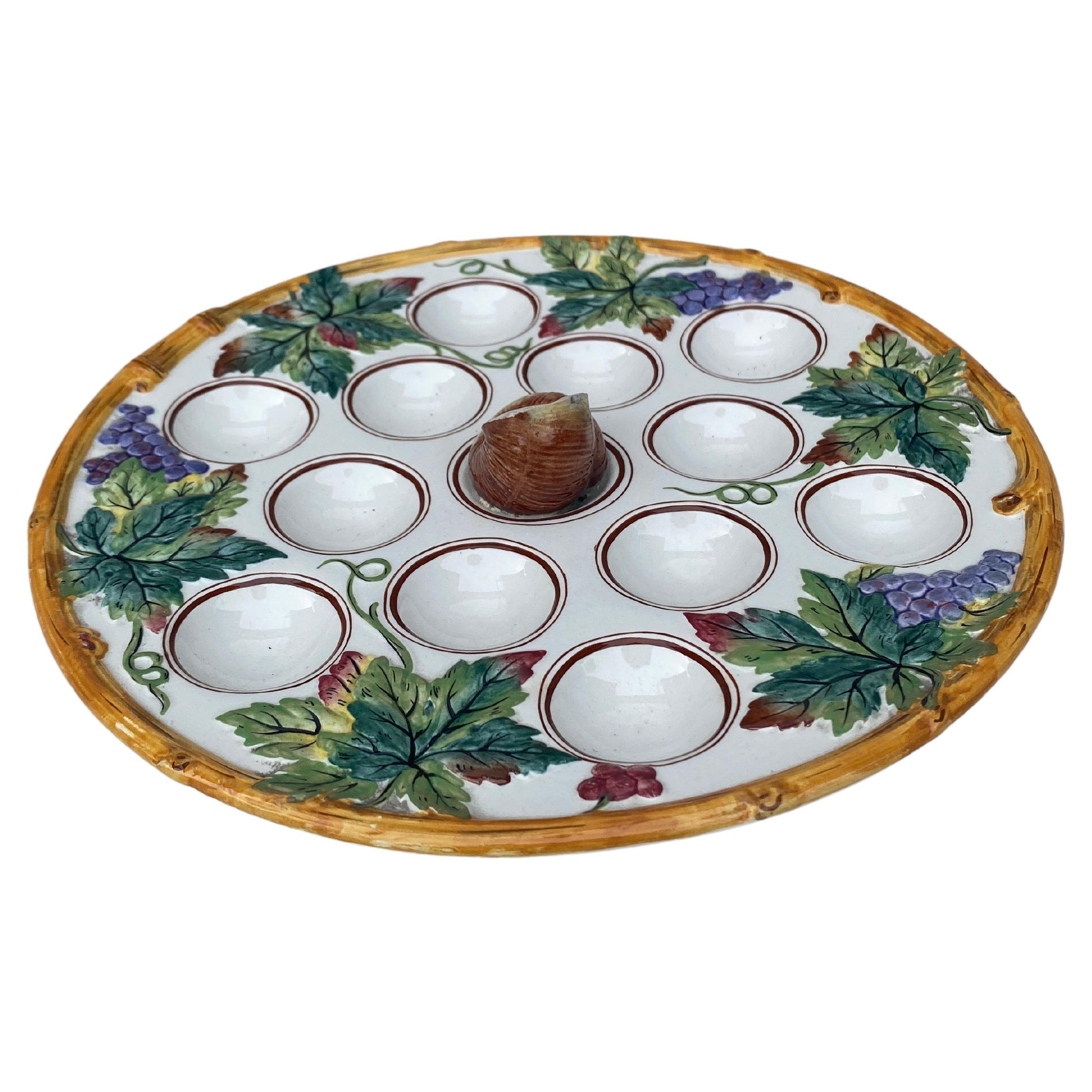 Unusual 19th century Majolica Snail Platter attributed to Luneville.
Decorated with grapes.