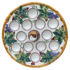 Plato de caracol de mayólica del siglo XIX Luneville