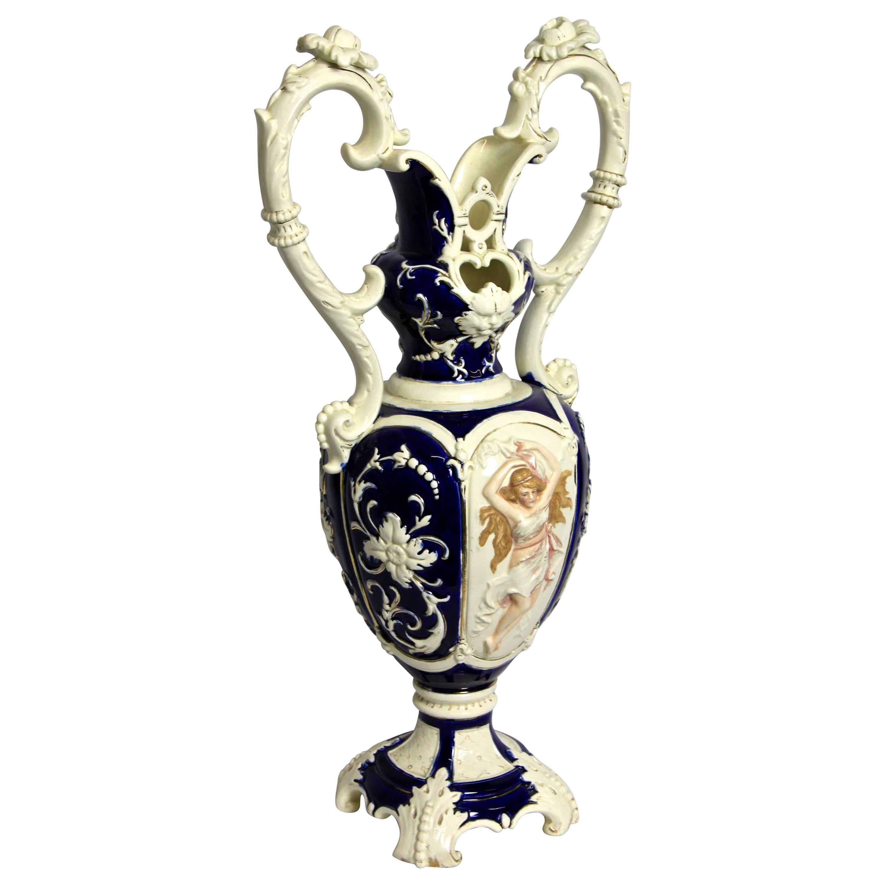 Remarkable Majolica vase from the renown manufactory of Eichwald in Bohemia, circa 1895. This elaborately processed late 19th century rare cobalt blue vase is a so-called 