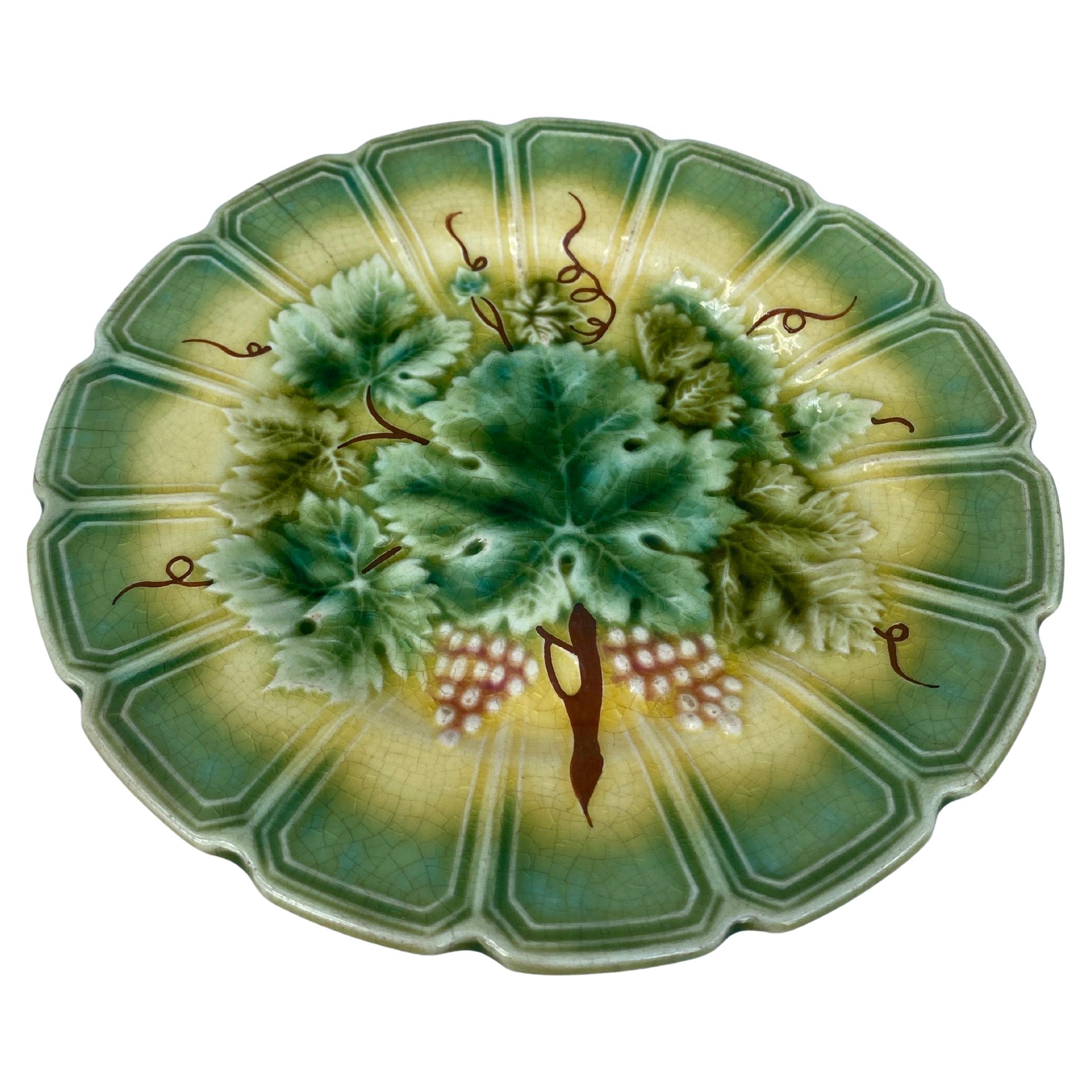 19th Century French Majolica plate with vine leaves signed Sarreguemines.