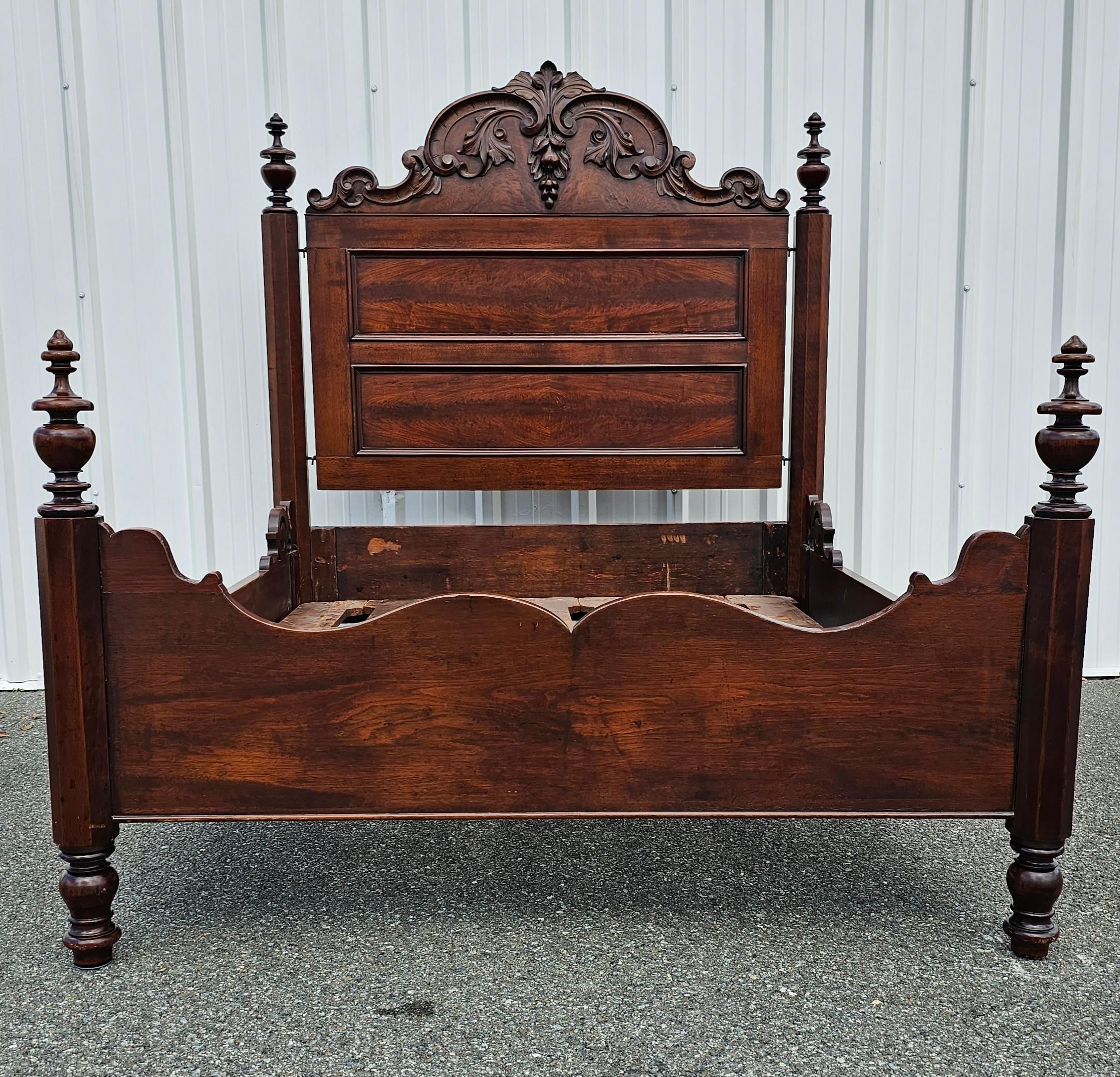 An American Victorian Rococo Revival carved Walnut bedstead, mid-19th century, attributed to Prudent Mallard, New Orleans.
The is antique has just been completely refinished, with a sophisticate and intricacately carved crest over a double panel