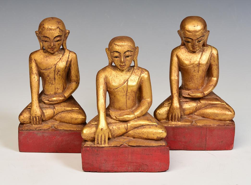 A set of Antique Burmese wooden seated disciples, with gilded gold.

Age: Burma, Mandalay Period, 19th Century
Size: Height 17.5 - 18.3 C.M. / Width 9.8 - 11.4 C.M.
Condition: Nice condition overall (some expected degradation due to their