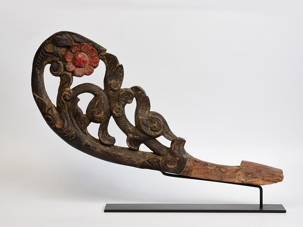 Burmese wood carving with stand.

Age: Burma, Mandalay Period, 19th Century
Size: Width 25 C.M. / Length 56.5 C.M.
Size including stand: Height 40 C.M.
Condition: Nice condition overall (some expected degradation due to its age). 

100%