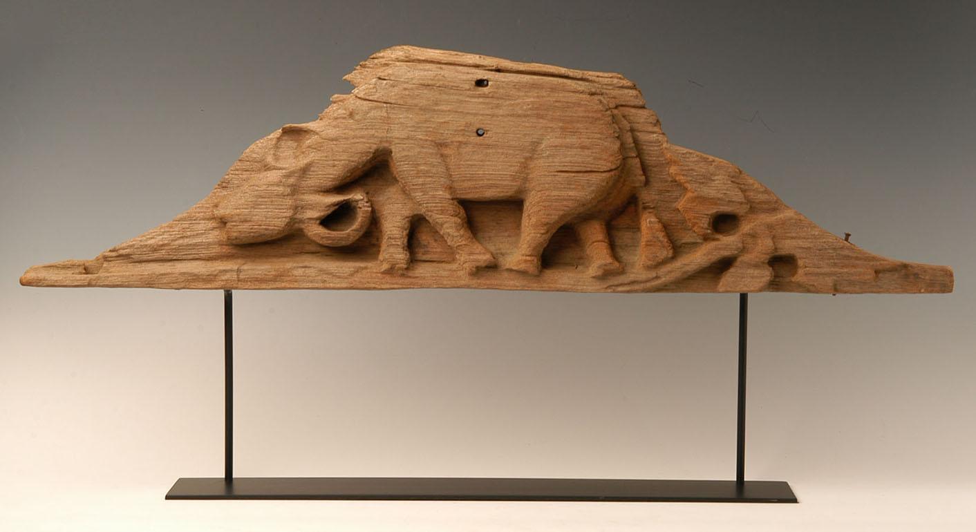 Burmese wood carving panel with animal buffalo, the carved have a curved shape.

Age: Burma, Mandalay Period, 19th century
Size: Length 89.5 C.M. / Height 23.6 C.M.
Size including stand: Height 43.5 C.M.
Condition: Nice condition overall (some