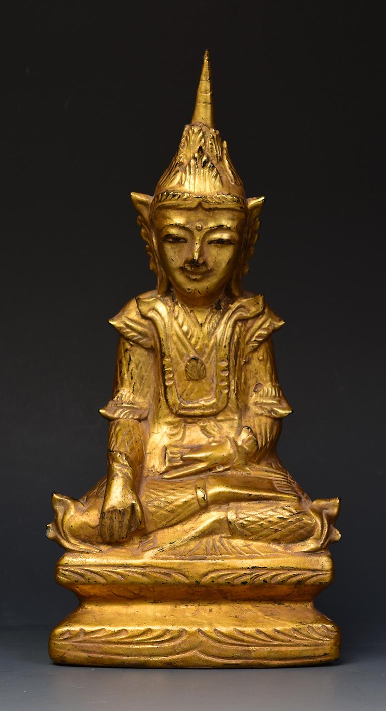 Burmesische hölzerne gekrönte Buddha mit vergoldetem Gold oder manchmal als 