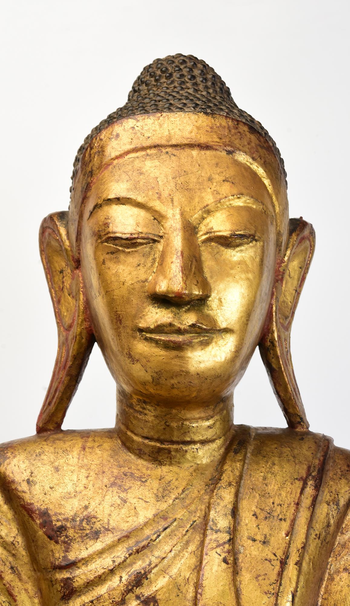 Antique Burmese wooden Buddha standing on a lotus base, with gilded gold.

Age: Burma, Mandalay Period, 19th Century
Size excluding black stand: Height 112.5 C.M. / Width 45.5 C.M. / Depth 19.5 C.M.
Height including black stand: 128.7