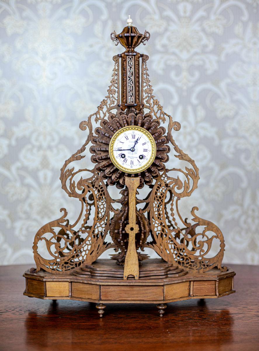 French Elaborately Carved Exotic Wood Mantel Clock from the Late 19th Century For Sale