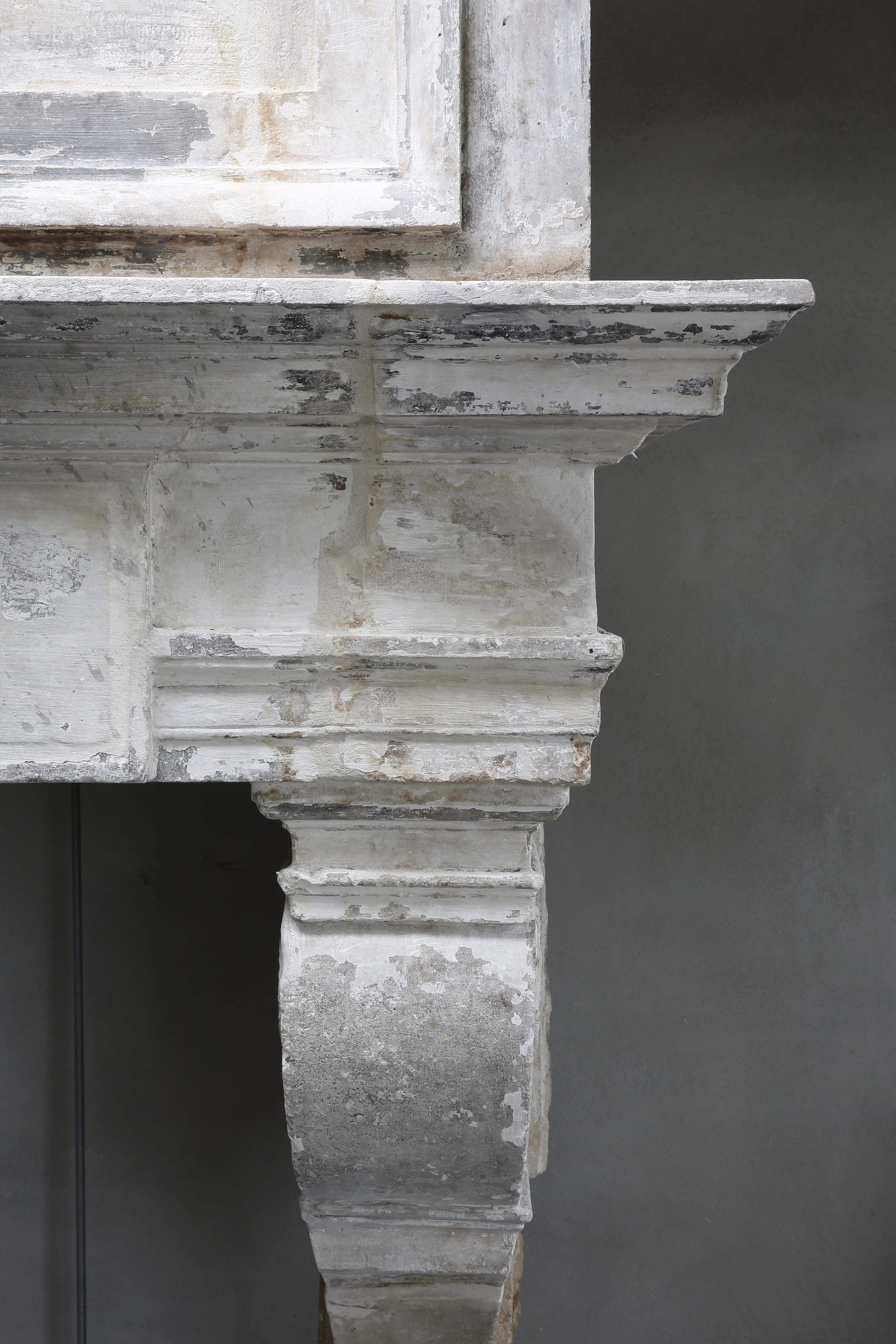 18th Century and Earlier Antique Fireplace  18th Century  Louis XIII + Trumeau  French Limestone