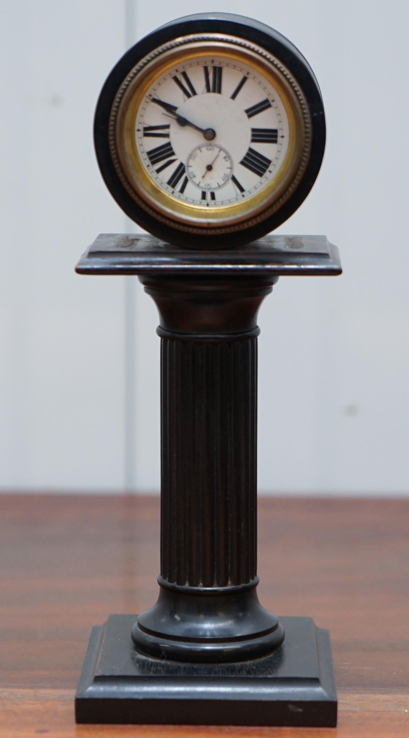 We are delighted to offer for sale this very rare 19th-century small mantle clock of a subtle pillar or column with original paint

A very lovely clock, the clock face itself is hand painted on white porcelain, its exquisite work, the movement is