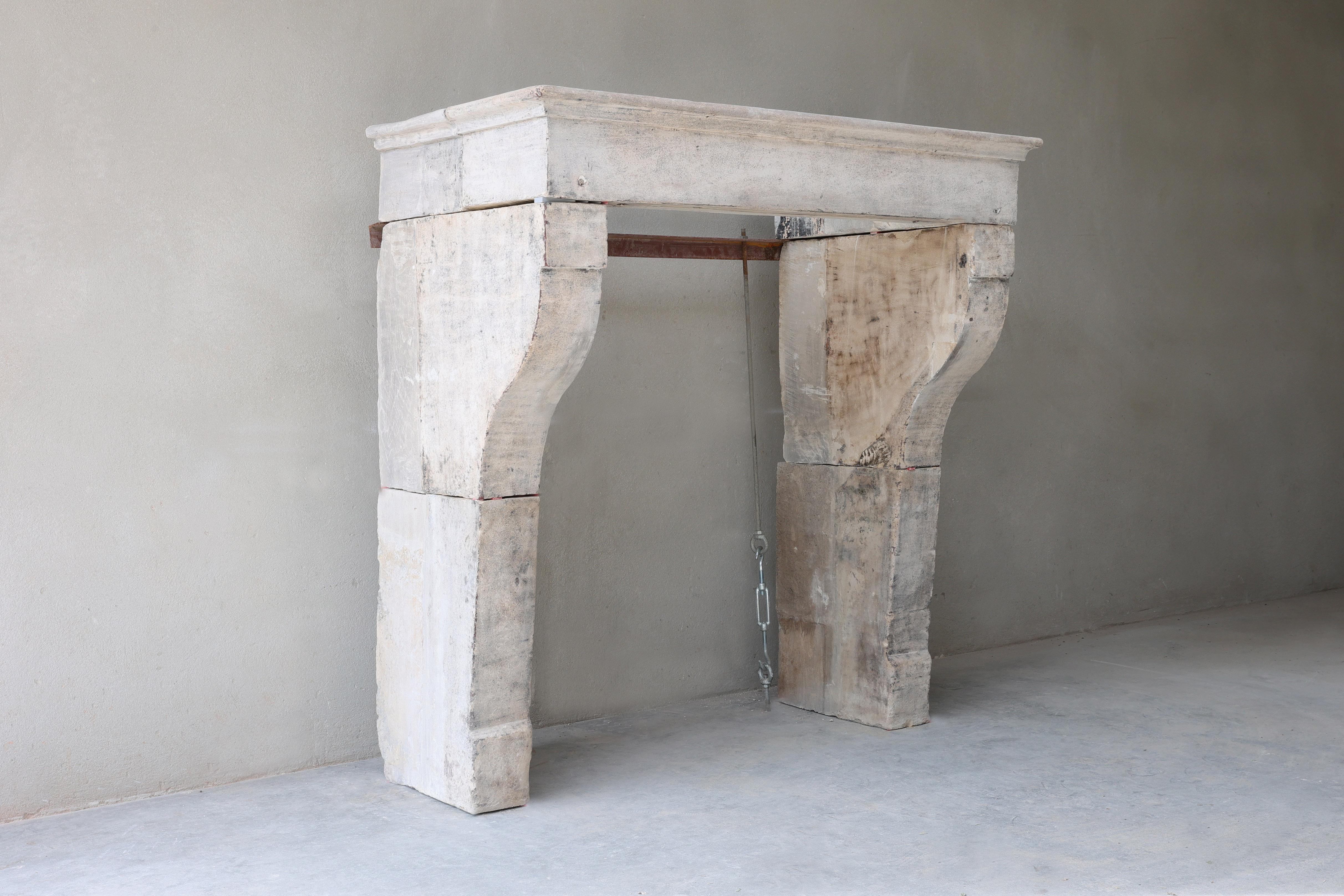 Very nice rustic fireplace from the 19th century! This fireplace is in Campagnarde style and has a compact size. This French limestone mantel comes from the Beaune area and fits many interiors!