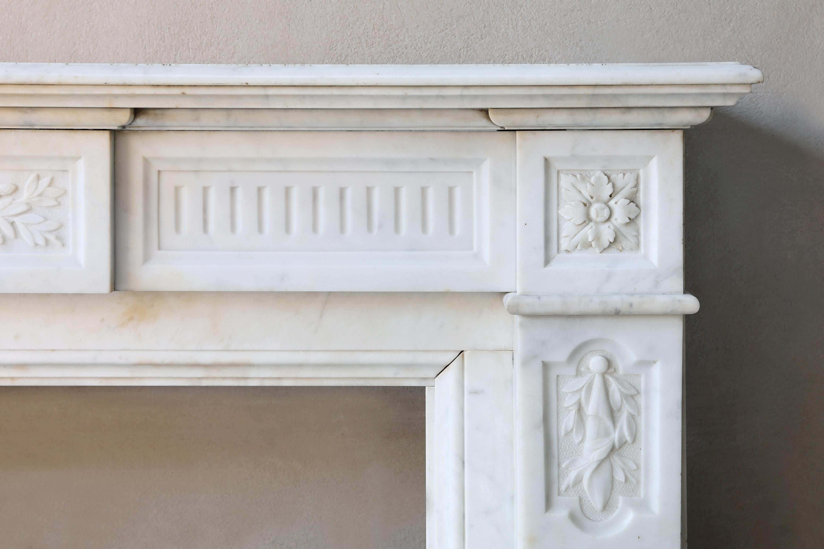 French 19th Century Mantle Surround of Carrara Marble in Style of Louis XVI For Sale