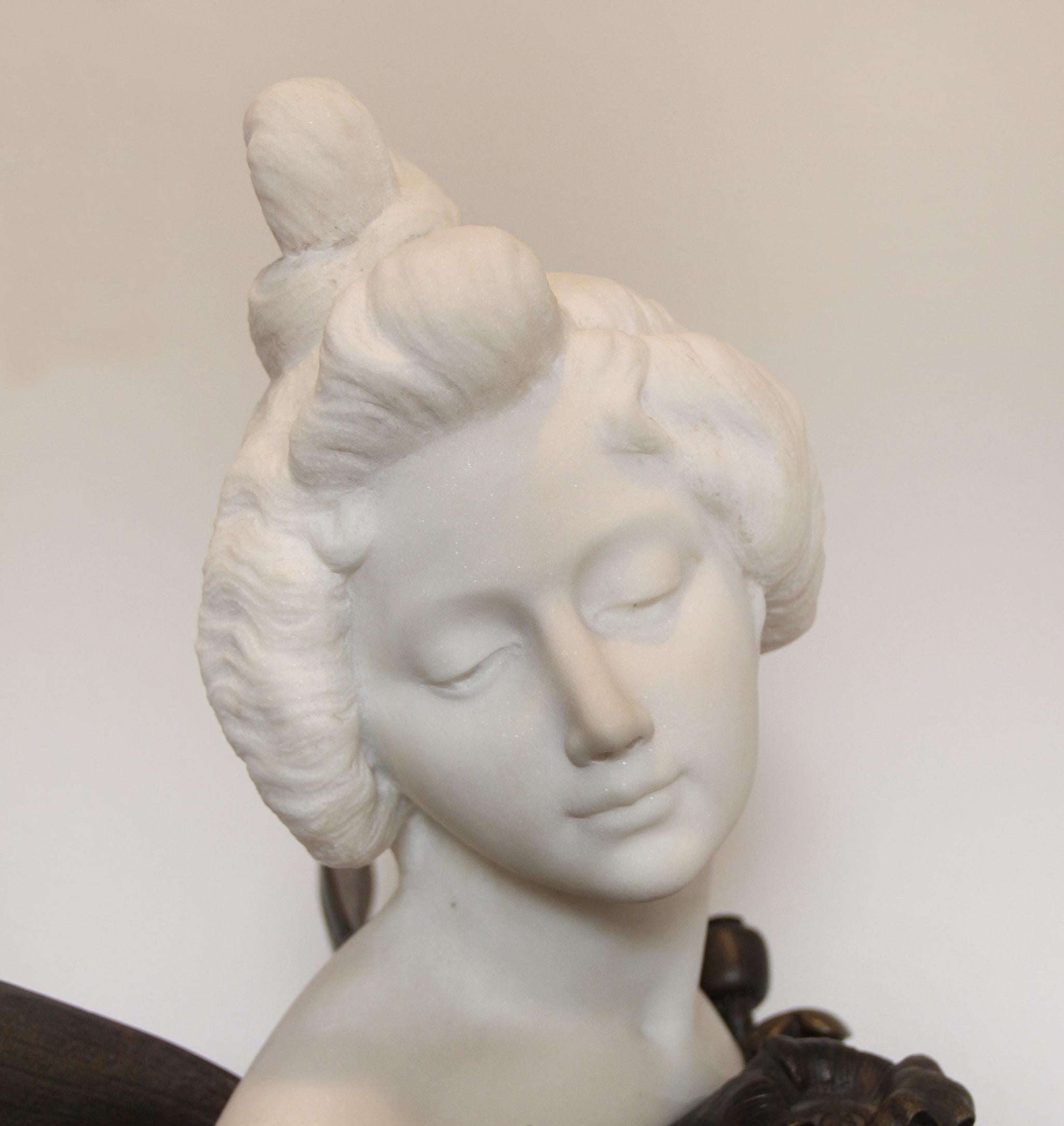 A stunning late 19th century Carrara marble and bronze bust entitled “Papillon De Nuit” by Joaquim Anglès

Depicting a beautiful woman with butterfly wings surrounded by flowers and foliage.

Inscribed Papillon De Nuit Par Anglès and signed