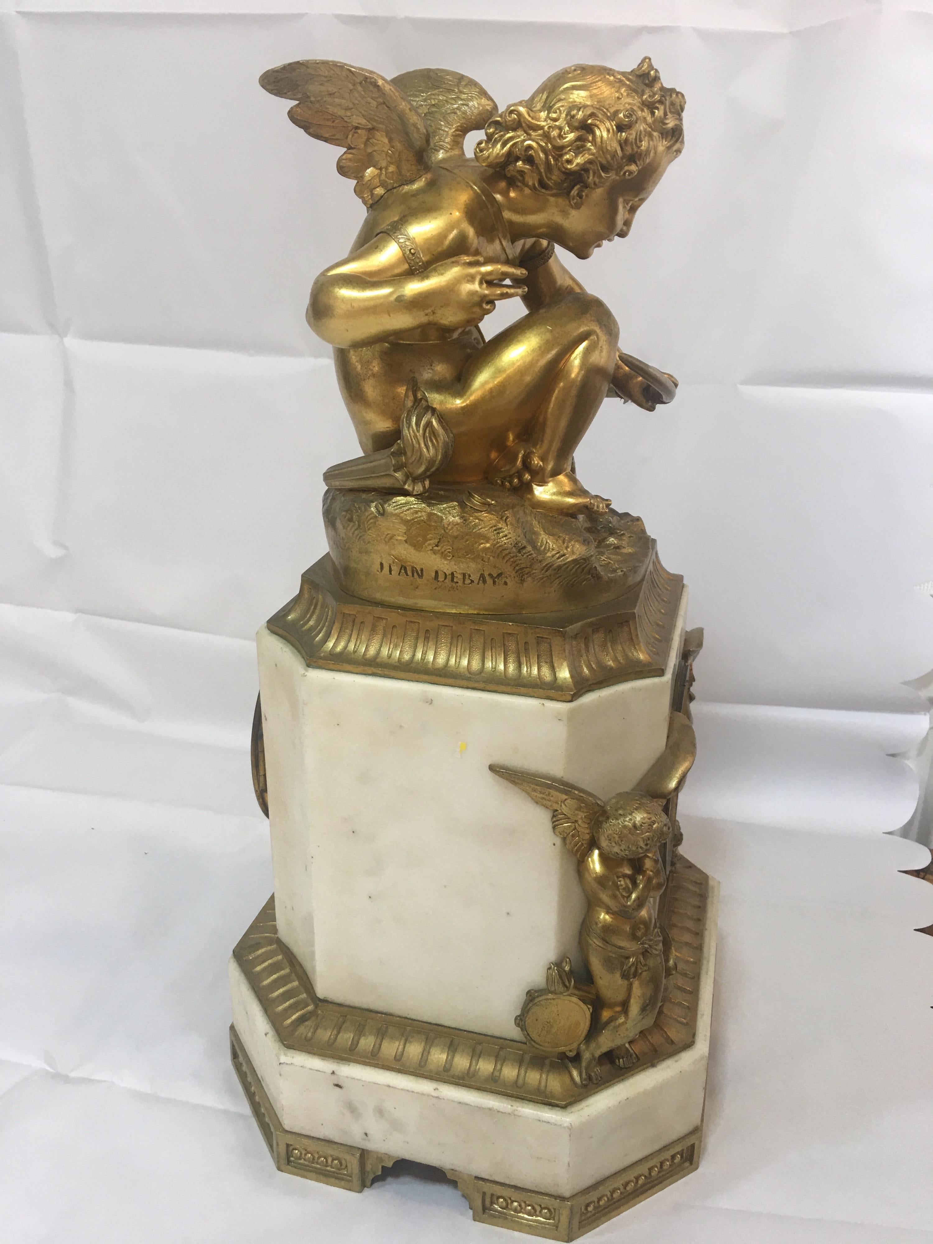 French 19th Century Marble Based Mantle Clock with Cherubs For Sale