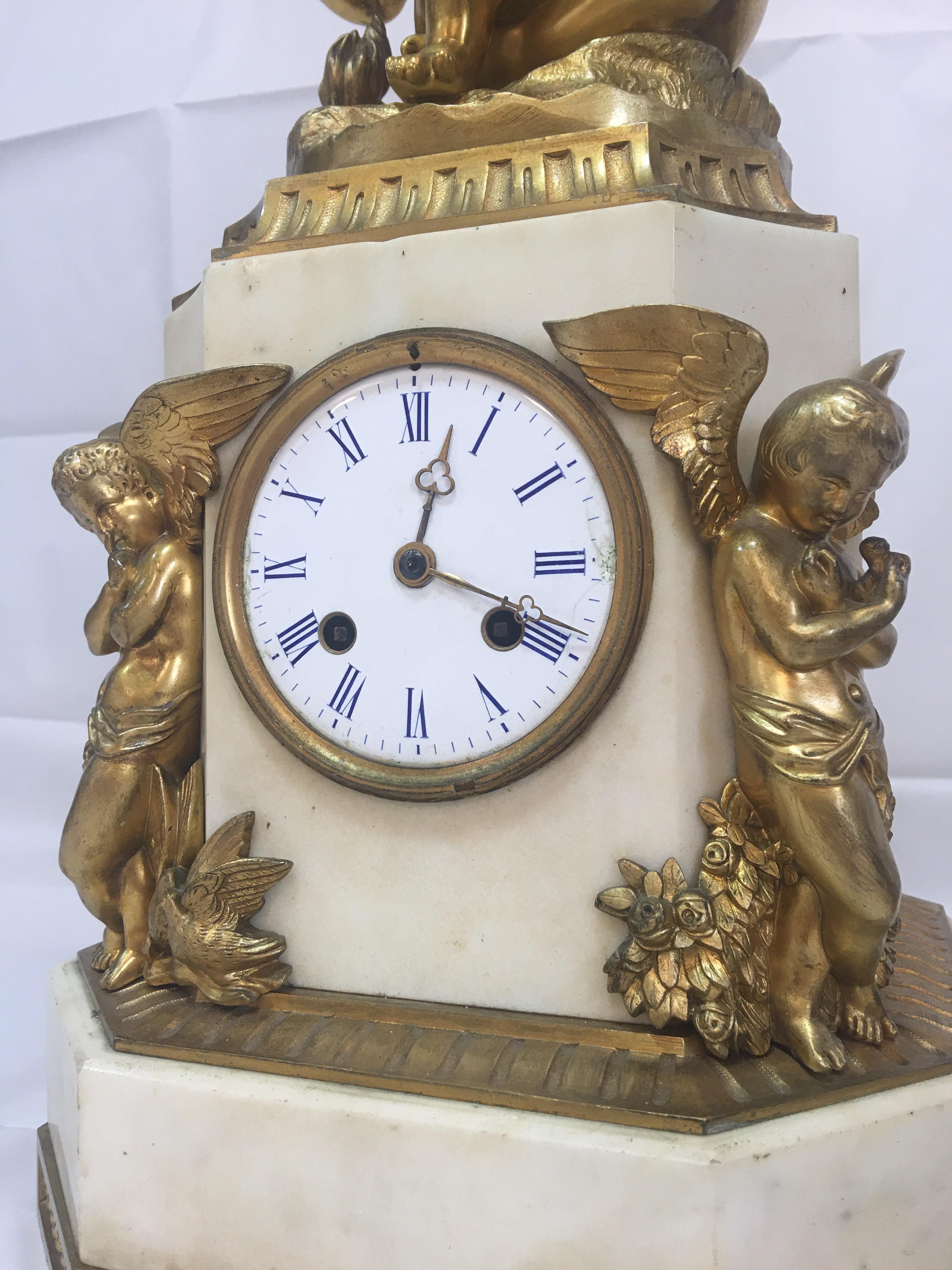 Gilt 19th Century Marble Based Mantle Clock with Cherubs For Sale