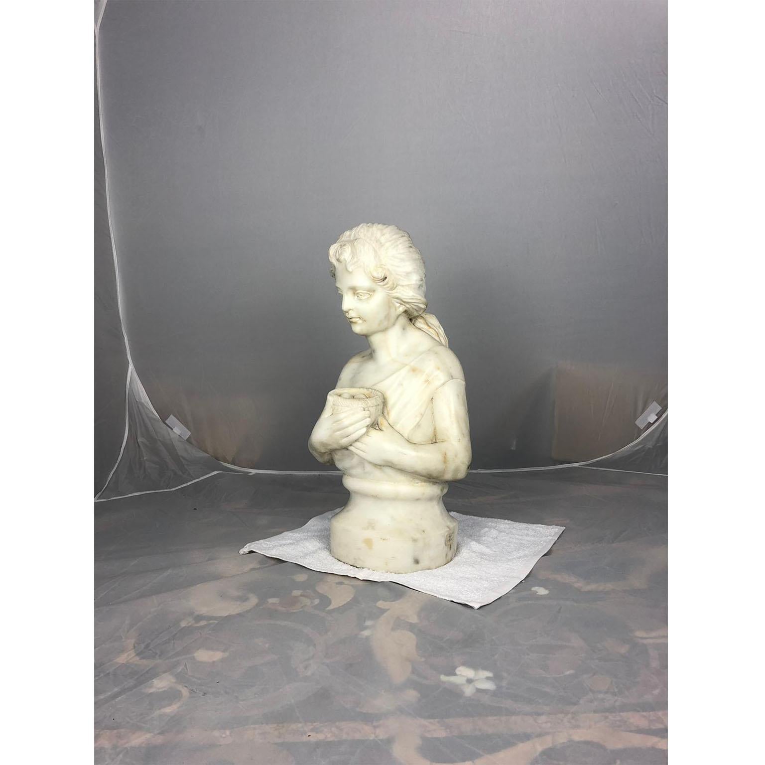 A 19th century marble bust of a child holding a birds nest.
A bird nest is a symbol of the home. It reminds us that we strive to make our home a place where family members grow and prosper. Considered a good luck symbol, the bird nest represents
